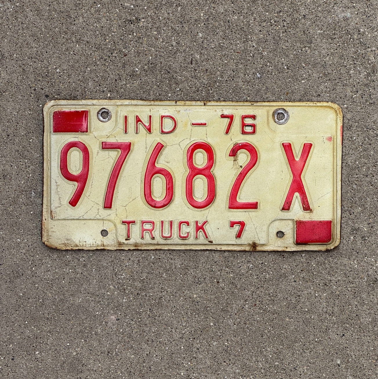 Photo of a 1976 Indiana Truck License Plate Auto Tag Garage Decor 97682 X