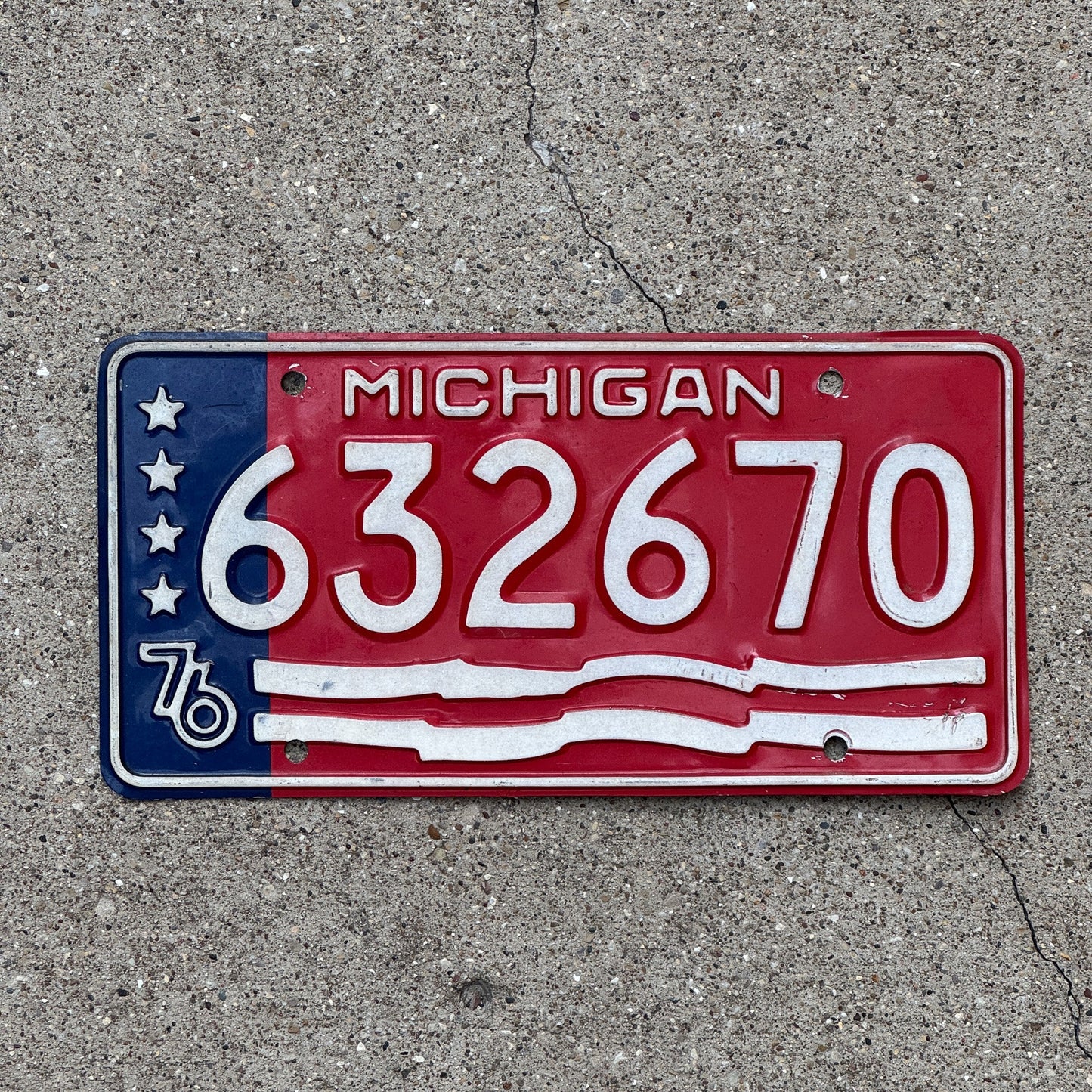 Photo of a 1976 Michigan License Plate Auto Tag Garage Decor Vintage Bicentennial Red White Blue 632670