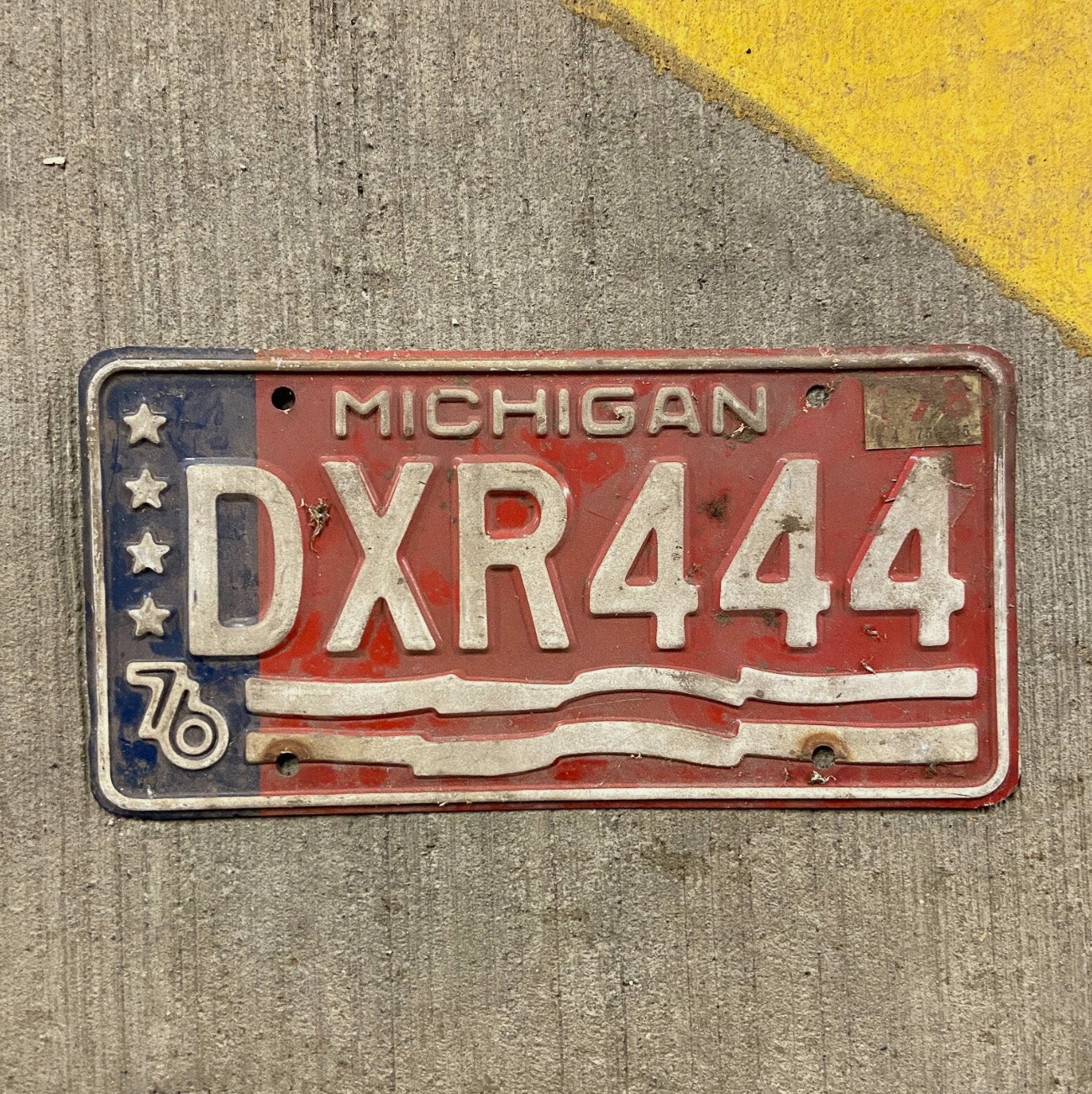 Photo of a 1976 Michigan License Plate Auto Tag Garage Decor Vintage Repeat Repeating DXR 444