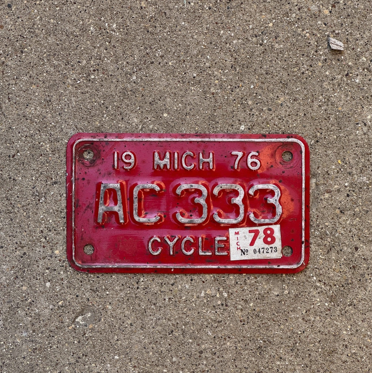 Photo of a 1976 Michigan Motorcycle License Plate Auto Tag Garage Repeating Repeating AC 333