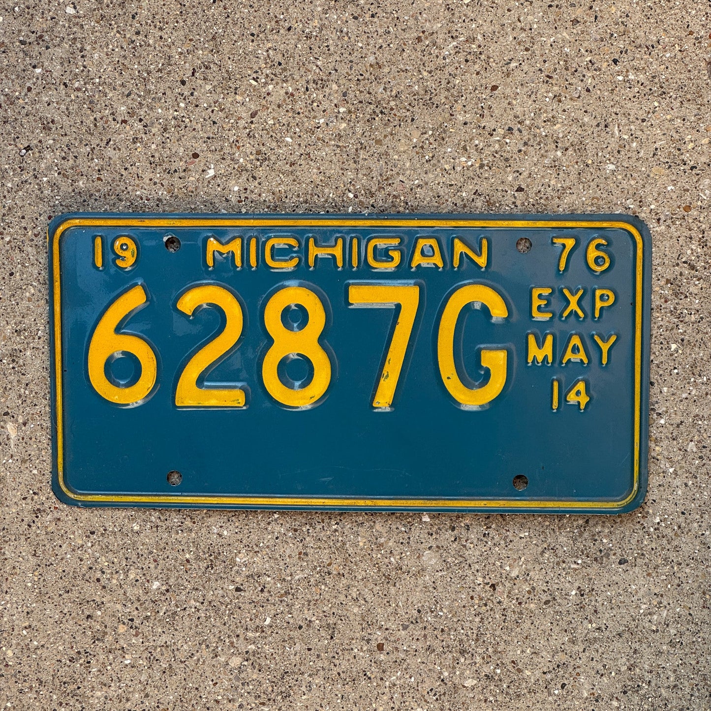 Photo of a 1976 Michigan Truck Half Year License Plate Auto Tag Garage Decor Vintage May 6287 G