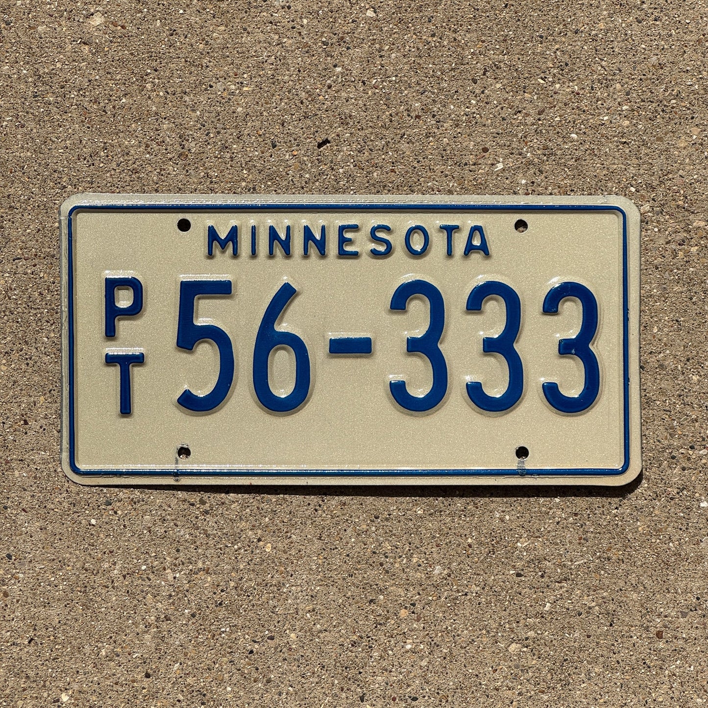 Photo of a 1976 Minnesota Prorate Trailer License Plate Auto Tag Garage Decor Vintage Repeat Repeating PT 56 333