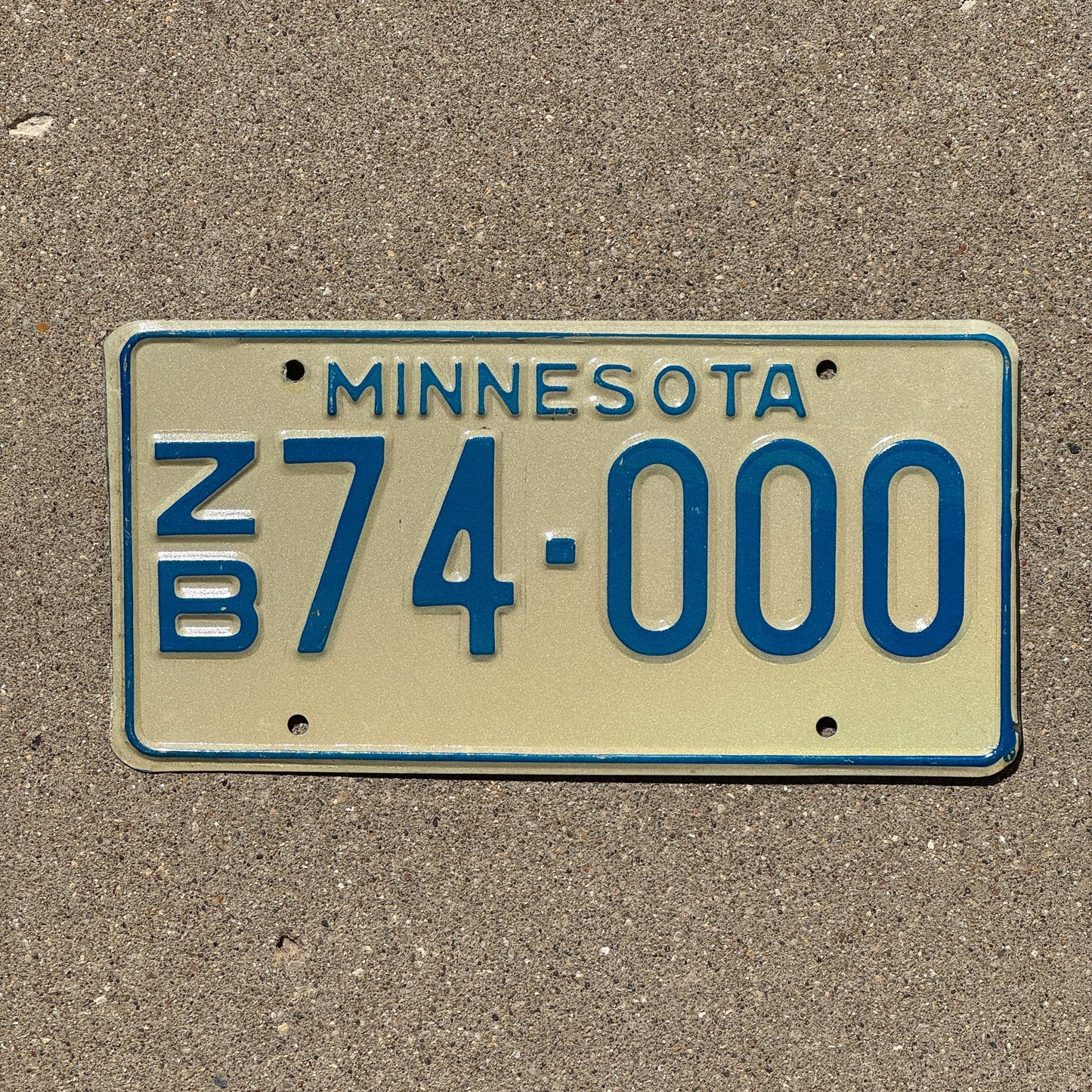 Photo of a 1976 Minnesota Trailer License Plate Auto Tag Garage Decor Vintage Repeat Repeating ZB 74000