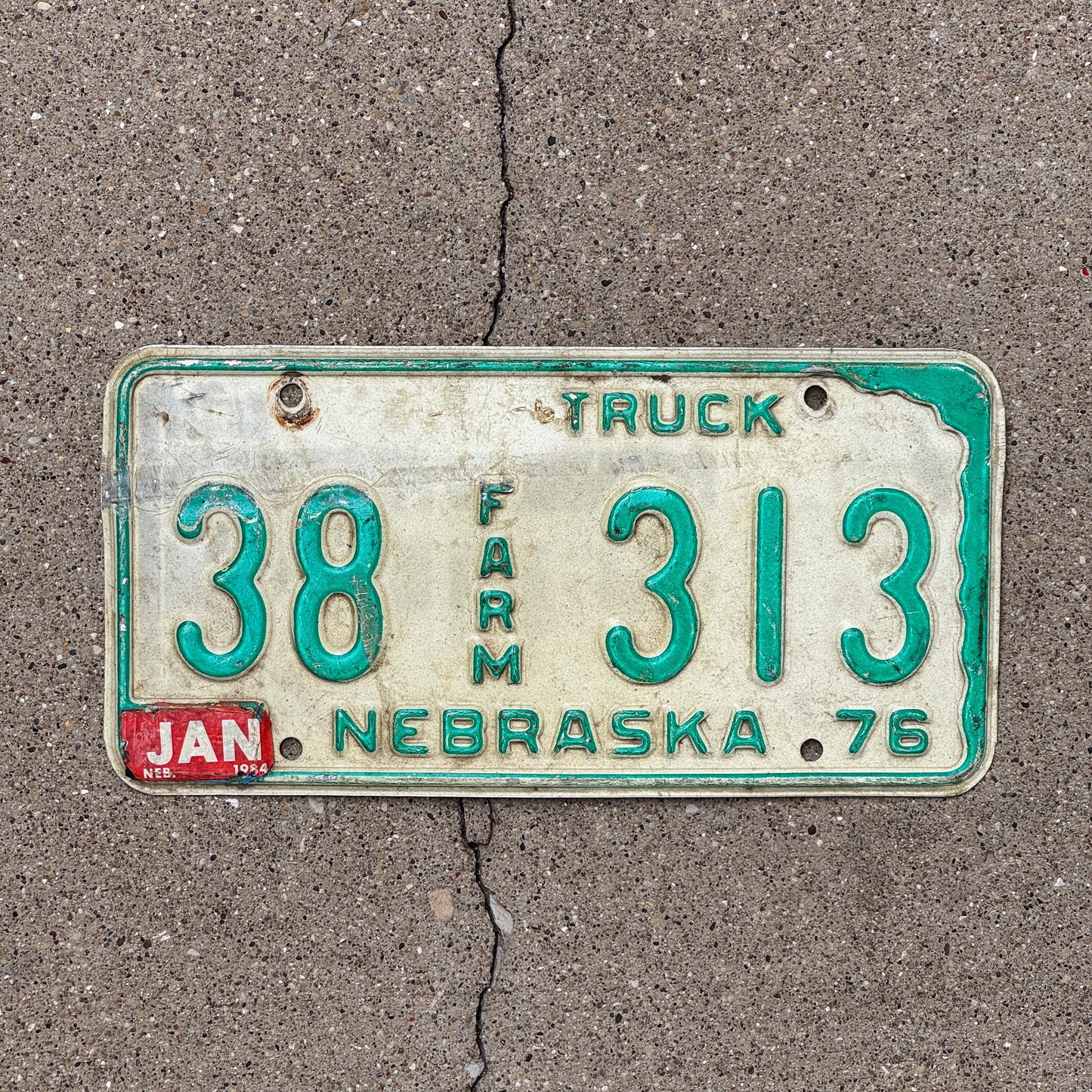 Photo of a 1976 Nebraska Farm Truck License Plate Auto Tag Garage Decor Vintage 38 313