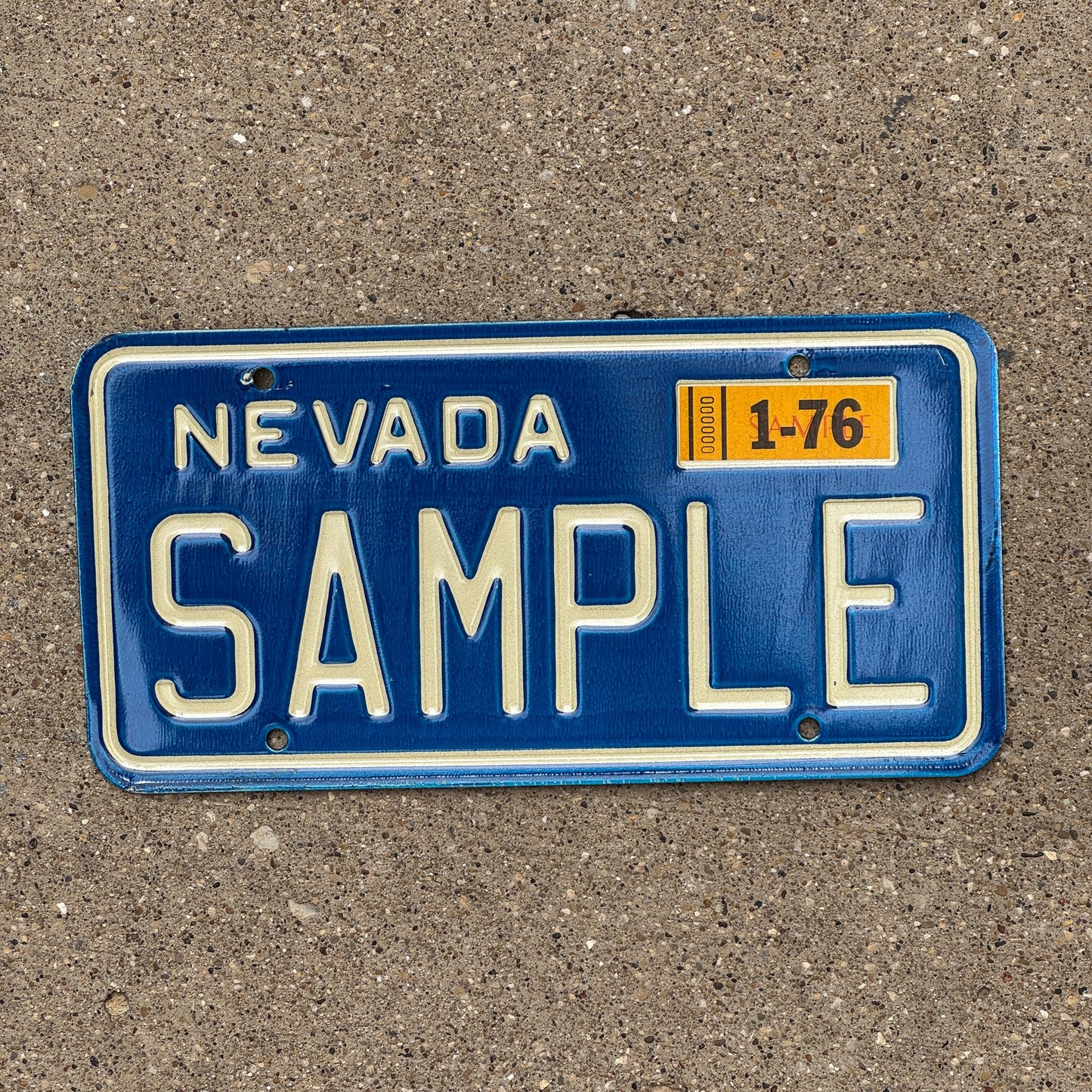 Photo of a 1976 Nevada SAMPLE License Plate Auto Tag Garage Decor Vintage SAMPLE
