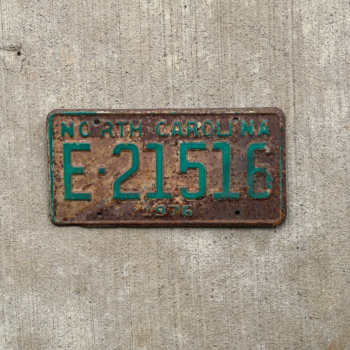 Photo of a 1976 North Carolina Trailer License Plate Auto Tag Garage Decor Vintage E 21516 with original patina