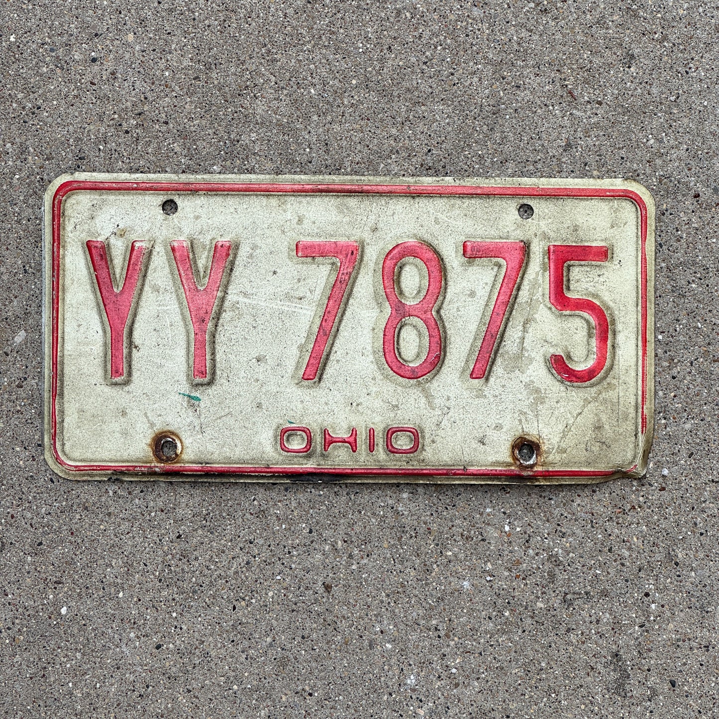 Photo of a 1976 Ohio License Plate Auto Tag 1 Vintage Garage YY 7875 with original patina