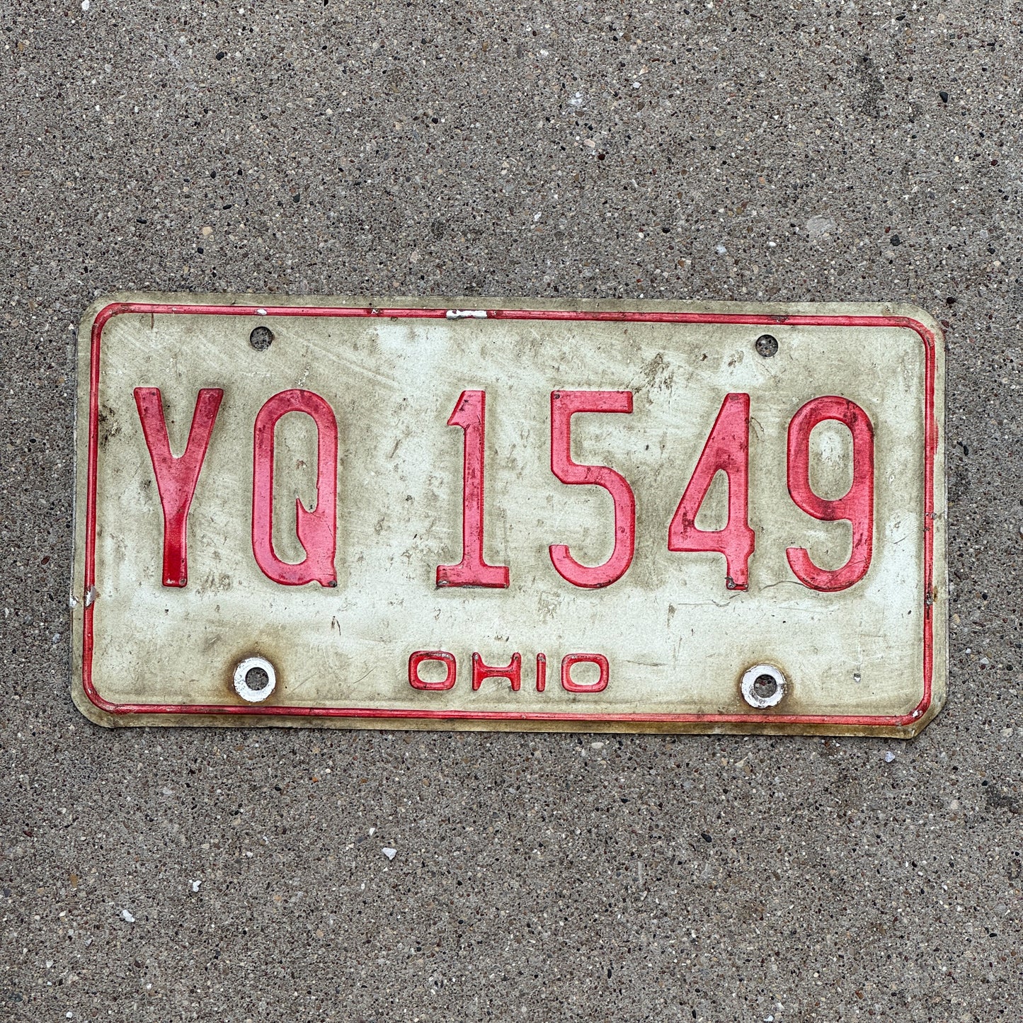 Photo of a 1976 Ohio License Plate Auto Tag Garage Decor Vintage YQ 1549 with original patina