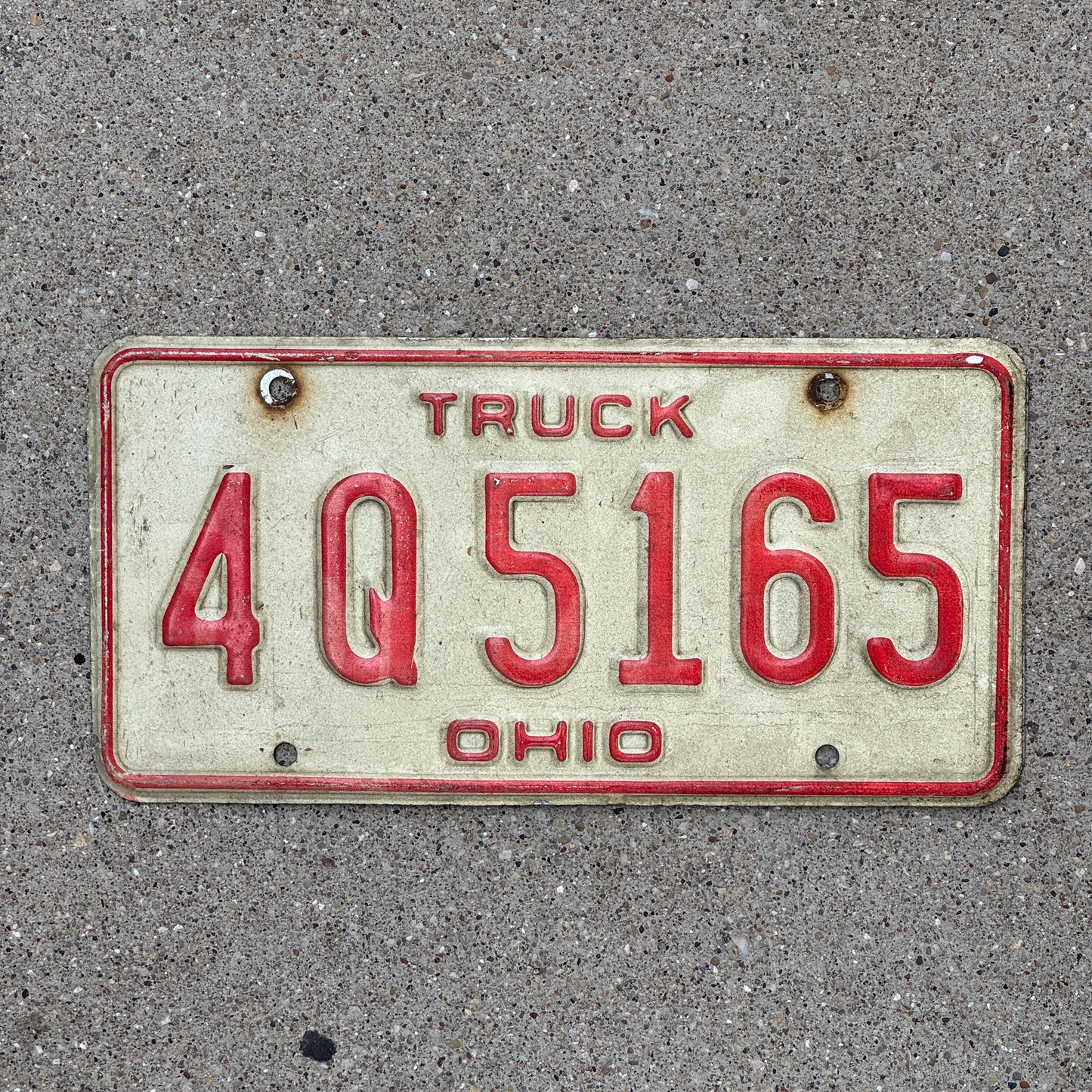 Photo of a 1976 Ohio Truck License Plate Auto Tag Garage Decor Vintage 4 Q 5165 with original patina