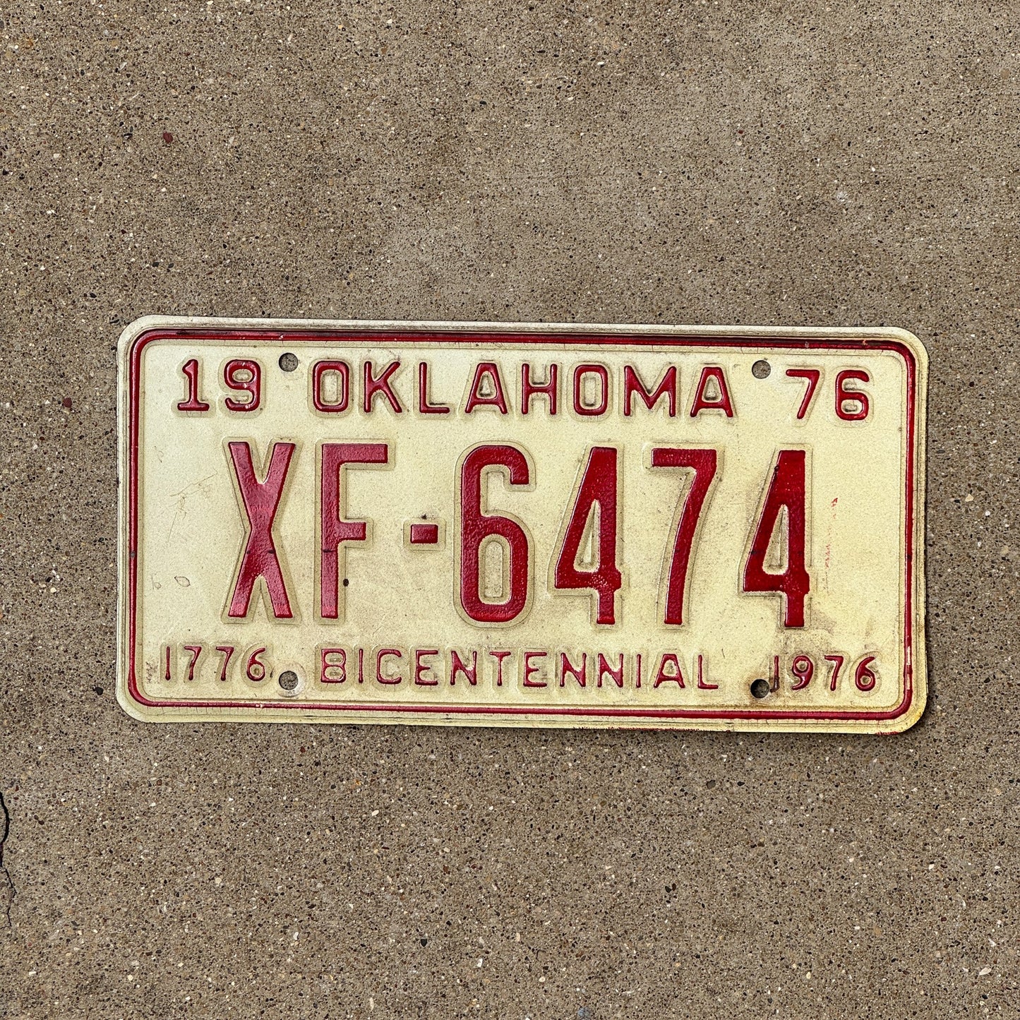 Photo of a 1976 Oklahoma License Plate Auto Tag Garage Decor Vintage XF 6474