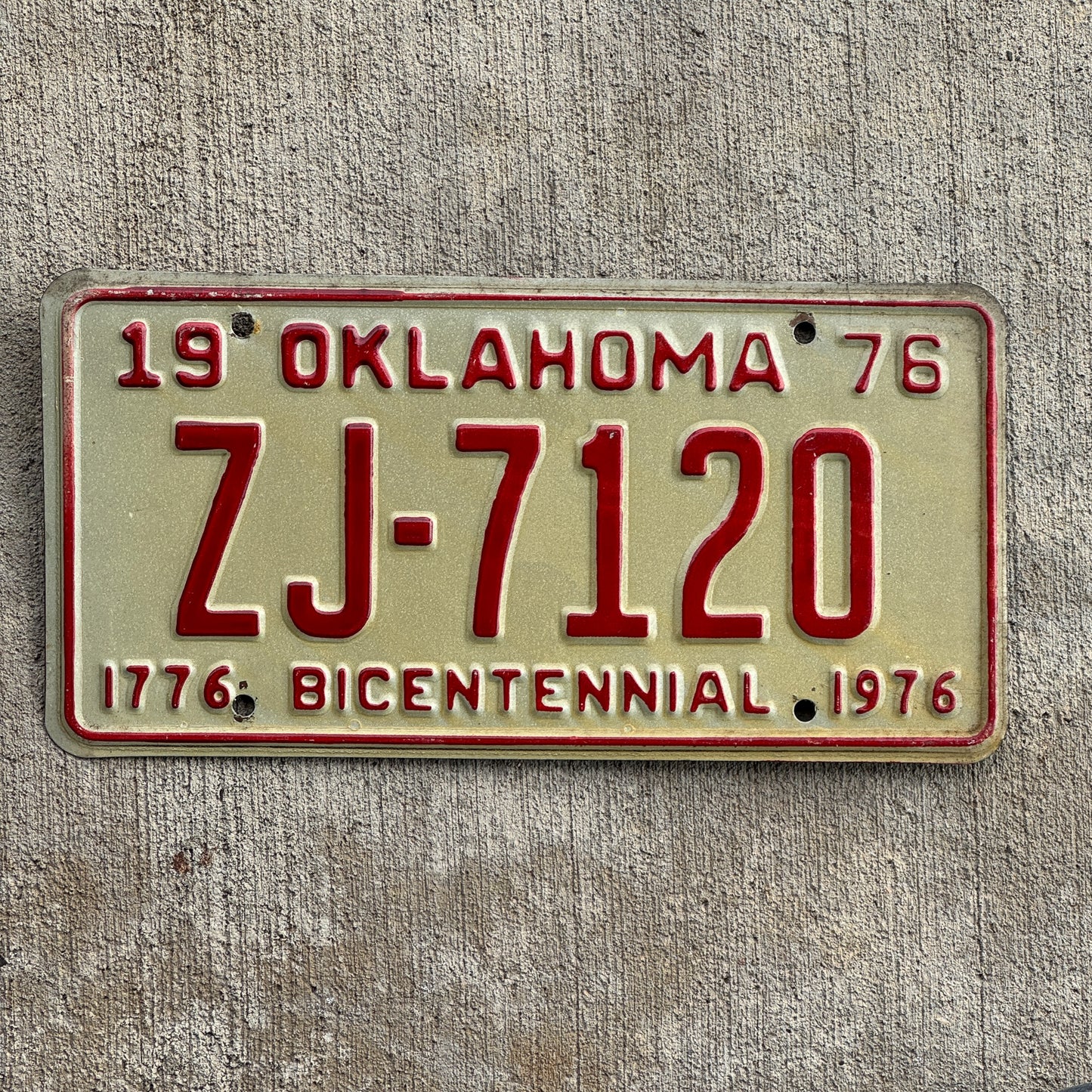 Photo of a 1976 Oklahoma License Plate Auto Tag Garage Decor Vintage ZJ 7120 with original patina