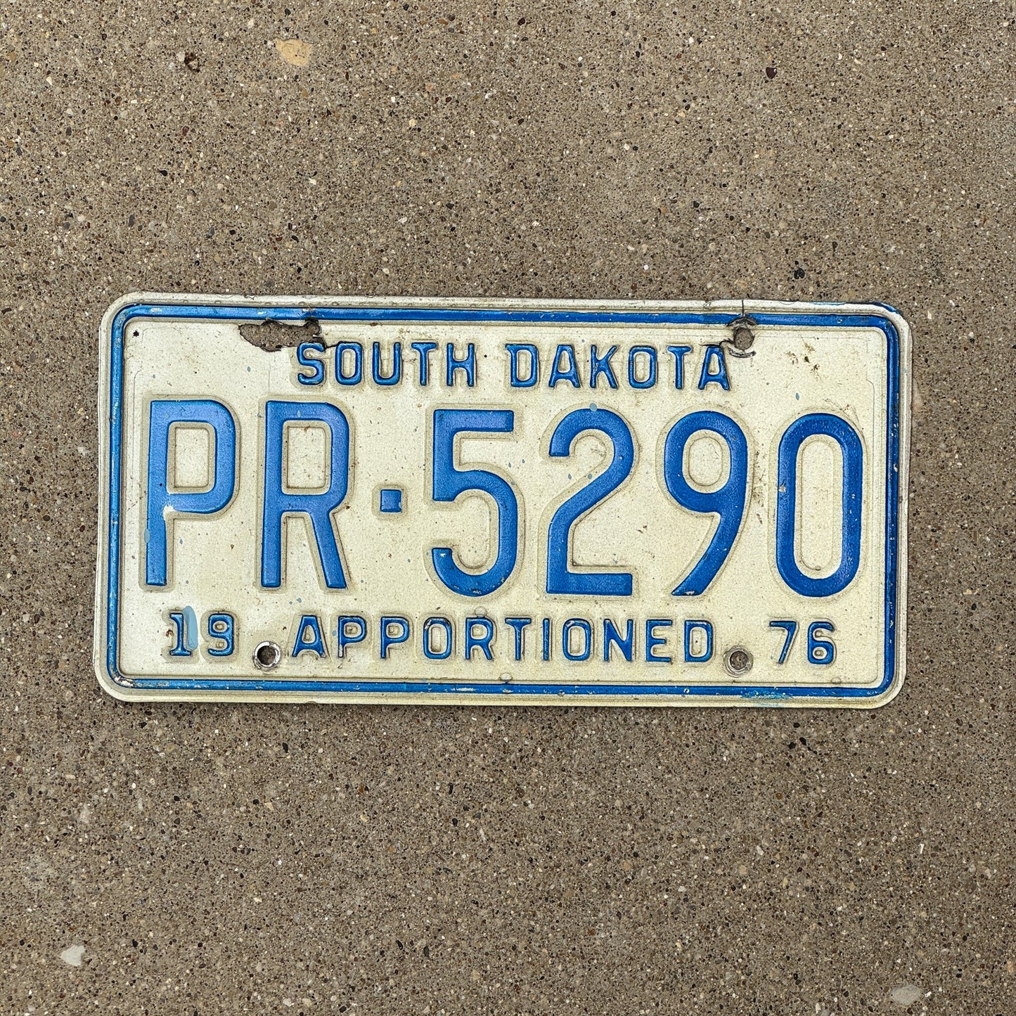 Photo of a 1976 South Dakota Apportioned License Plate Auto Tag Garage Decor Vintage PR 5290