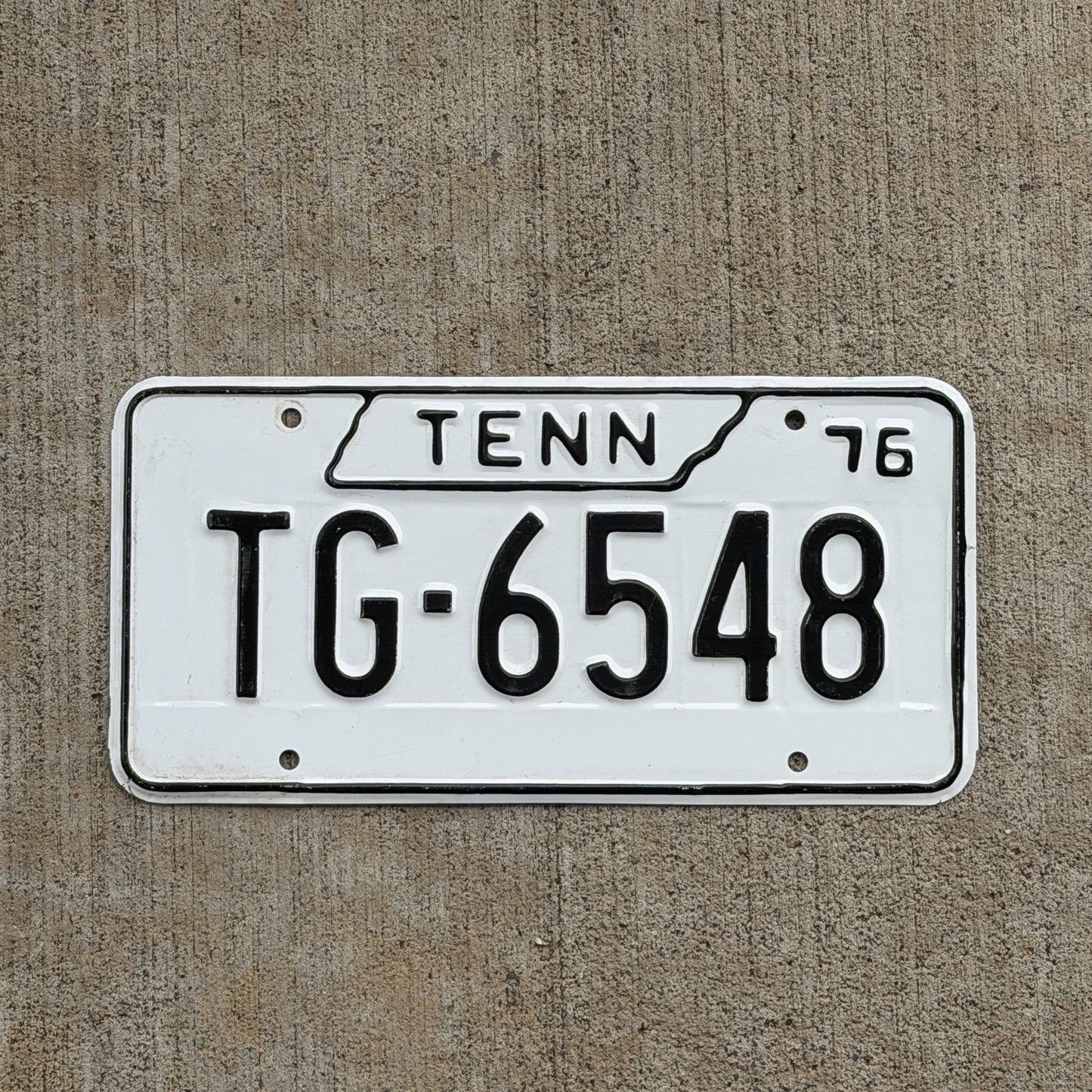 Photo of a 1976 Tennessee Trailer License Plate Auto Tag Garage Decor Vintage TG 6548 with original patina