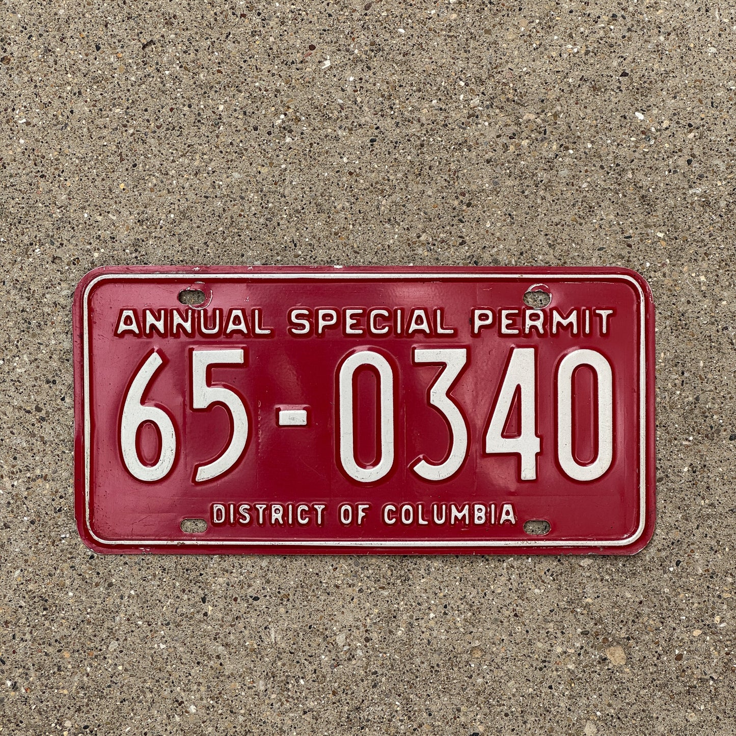 Photo of a 1976 Washington DC Special Permit License Plate Auto Tag Garage 2nd Issue 65 0340 with original patina