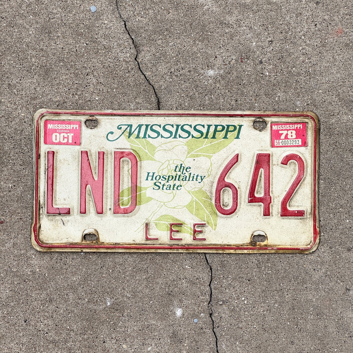 Photo of a 1977 1978 Mississippi License Plate Auto Tag Garage Decor Vintage LND 642 with original patina