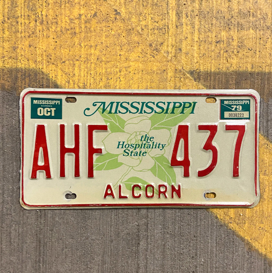 Photo of a 1977 1979 Mississippi License Plate Auto Tag Garage Decor Vintage AHF 437 with original patina