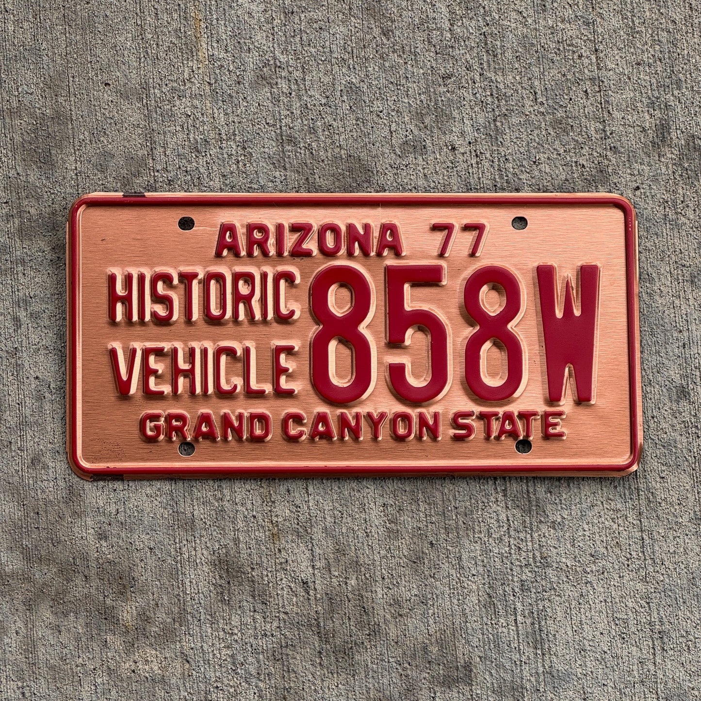 Photo of a 1977 Arizona Historic Vehicle License Plate Auto Tag Garage Decor Vintage Copper 858W with original patina