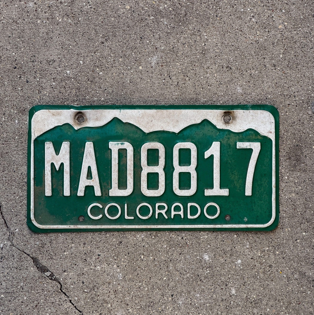 Photo of a 1977 Colorado License Plate Auto Tag Garage Decor MAD 8817