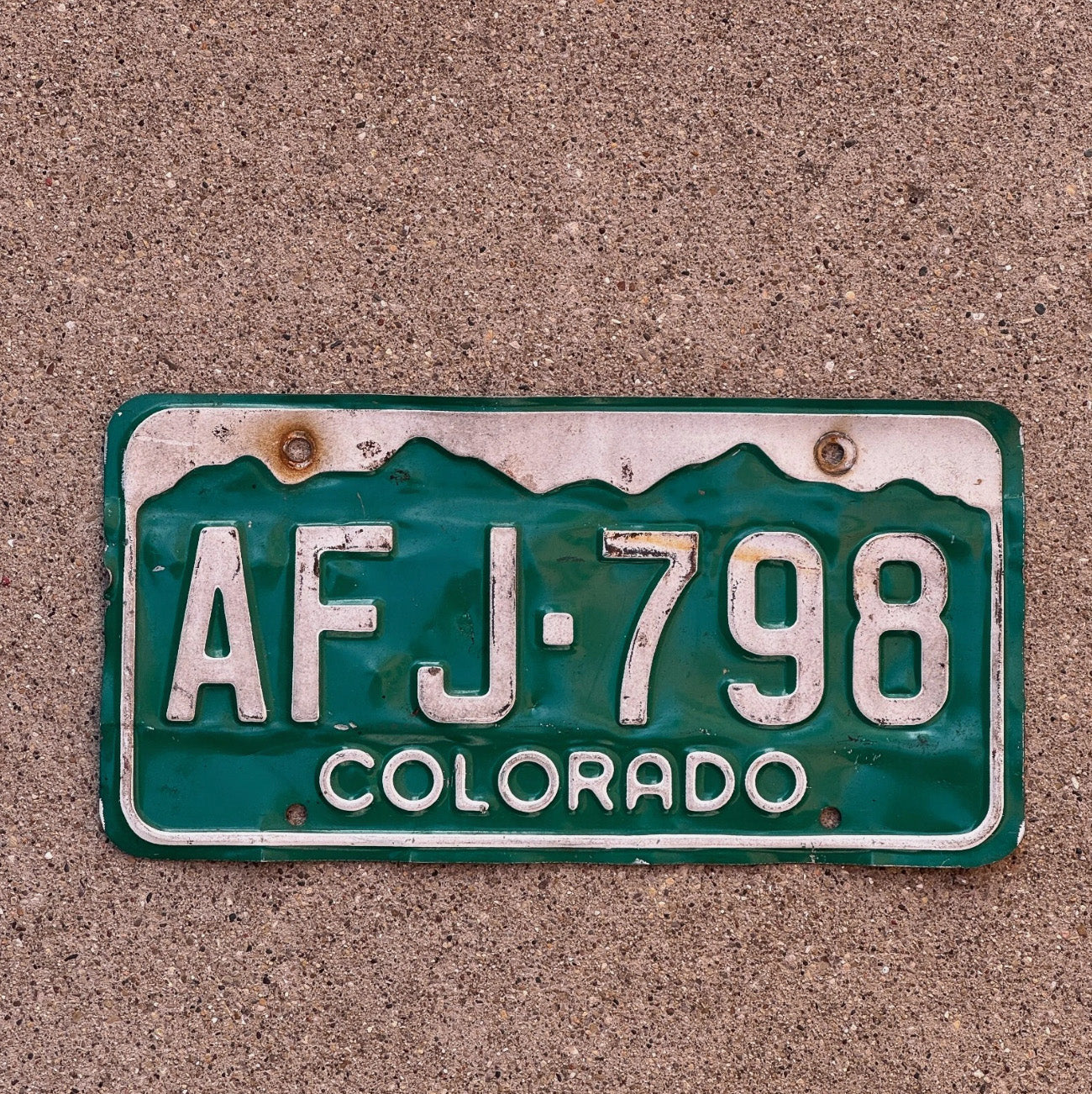Photo of a 1977 Colorado License Plate Auto Tag Garage Decor Vintage AFJ 798