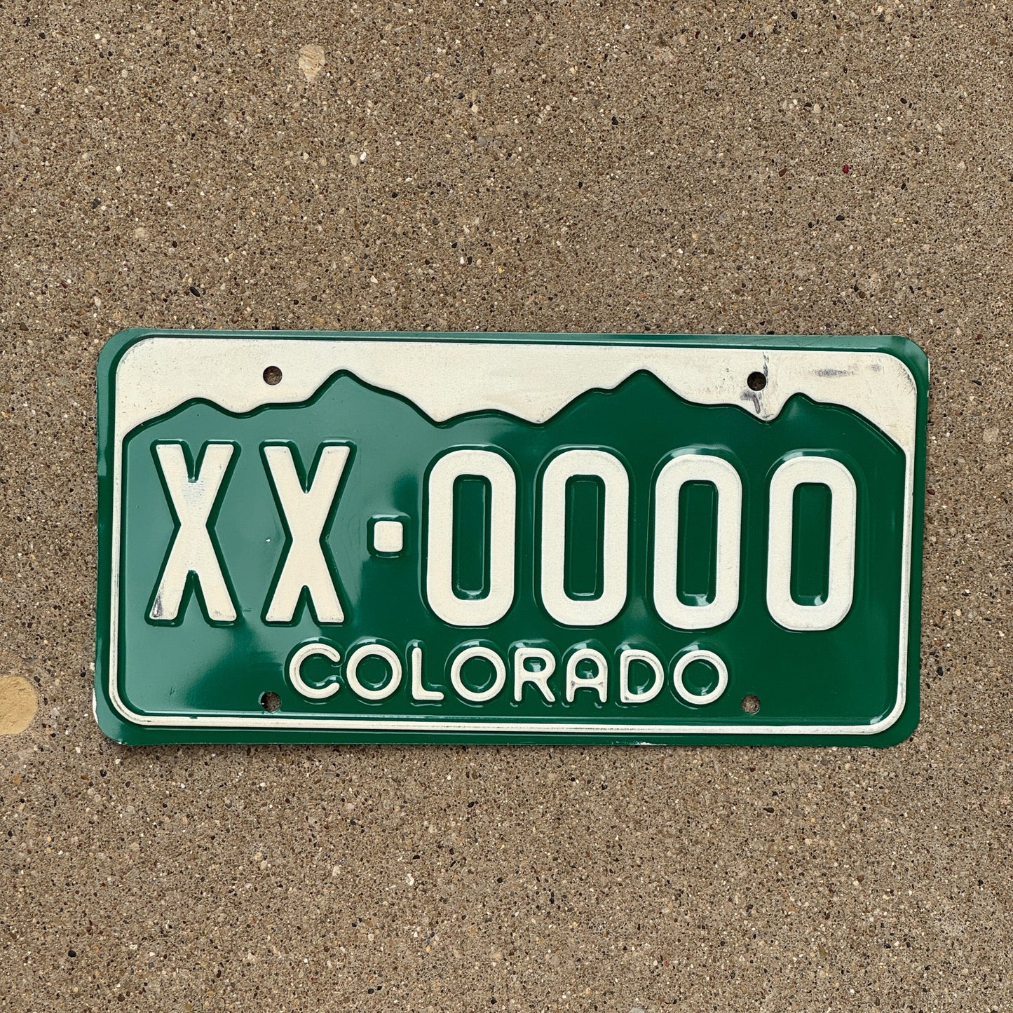 Photo of a 1977 Colorado SAMPLE License Plate Auto Tag Garage Decor Vintage XX 0000