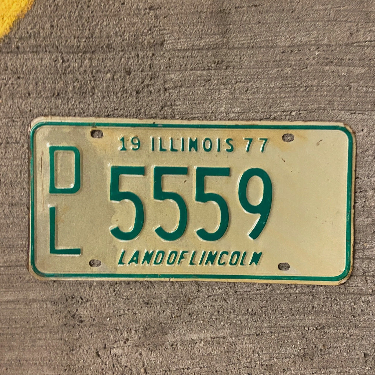Photo of a 1977 Illinois Dealer License Plate Auto Tag Garage Decor Vintage Repeat Repeating 5559 with original patina