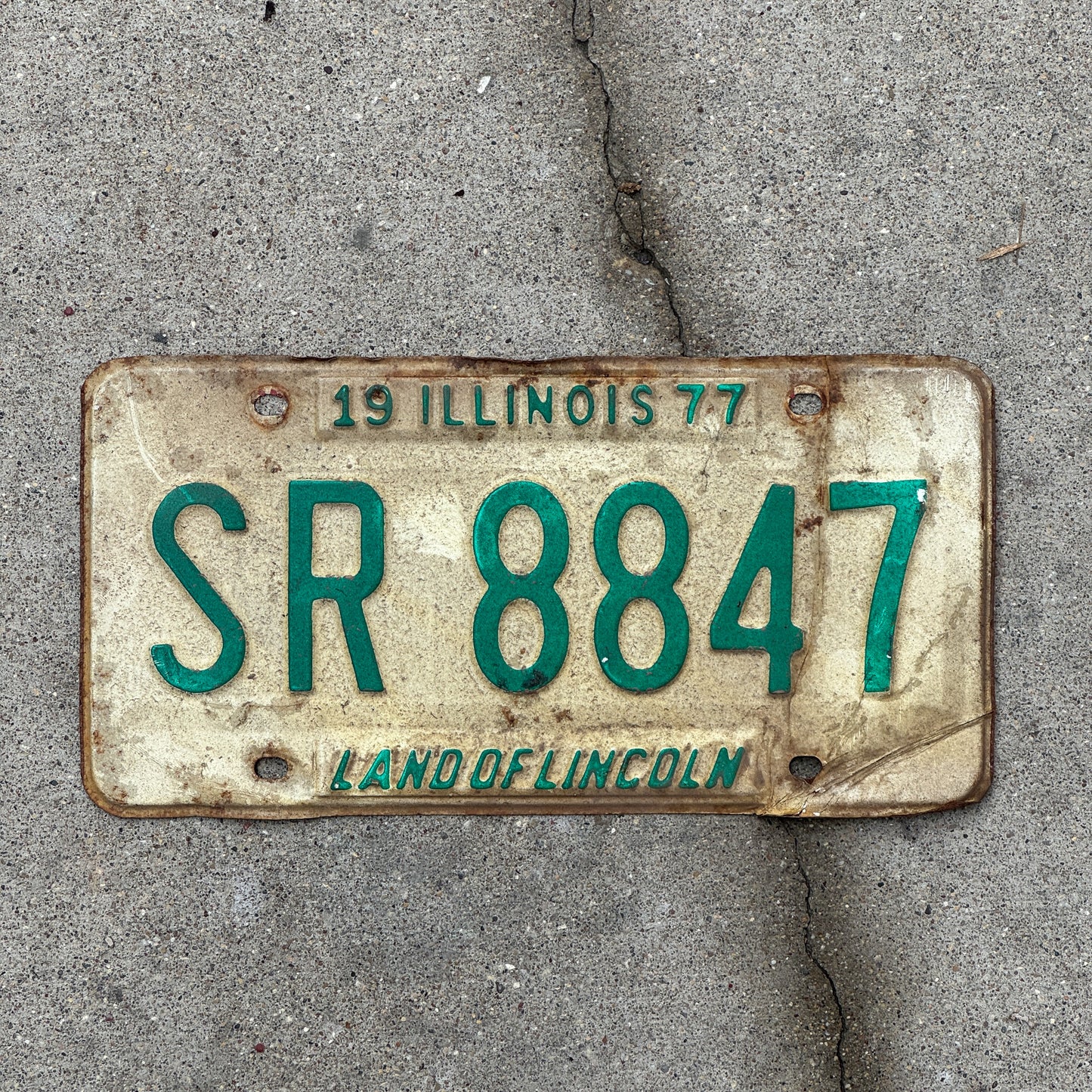 Photo of a 1977 Illinois License Plate Auto Tag 2 Vintage Garage SR 8847 with original patina