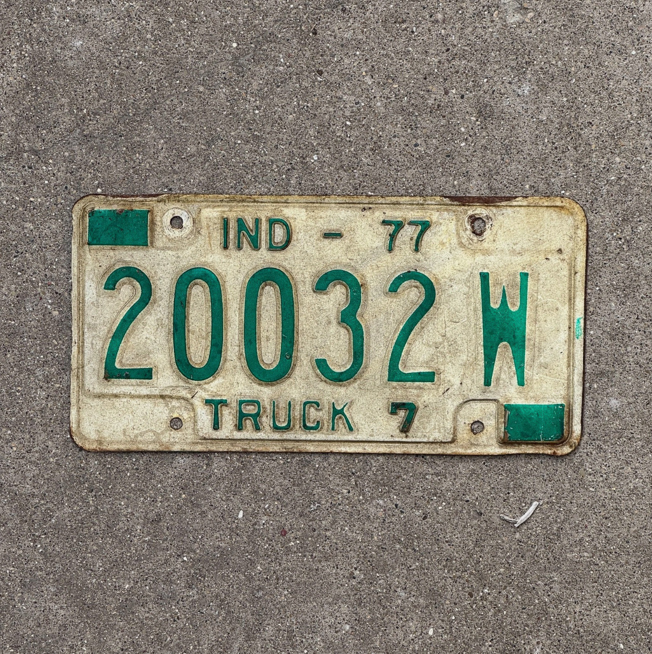 Photo of a 1977 Indiana Truck License Plate Auto Tag Garage Decor 20032 W