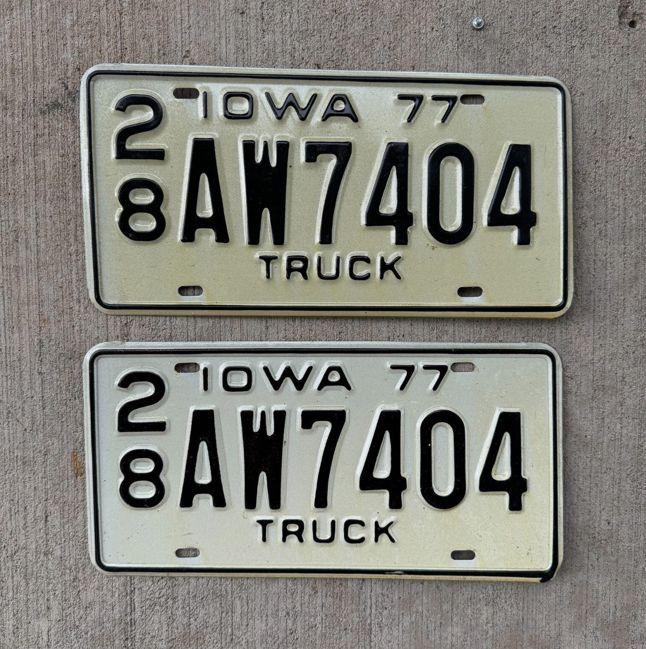 Photo of a 1977 Iowa Truck License Plate Pair Auto Tag Garage Decor Vintage Cute AW 7404