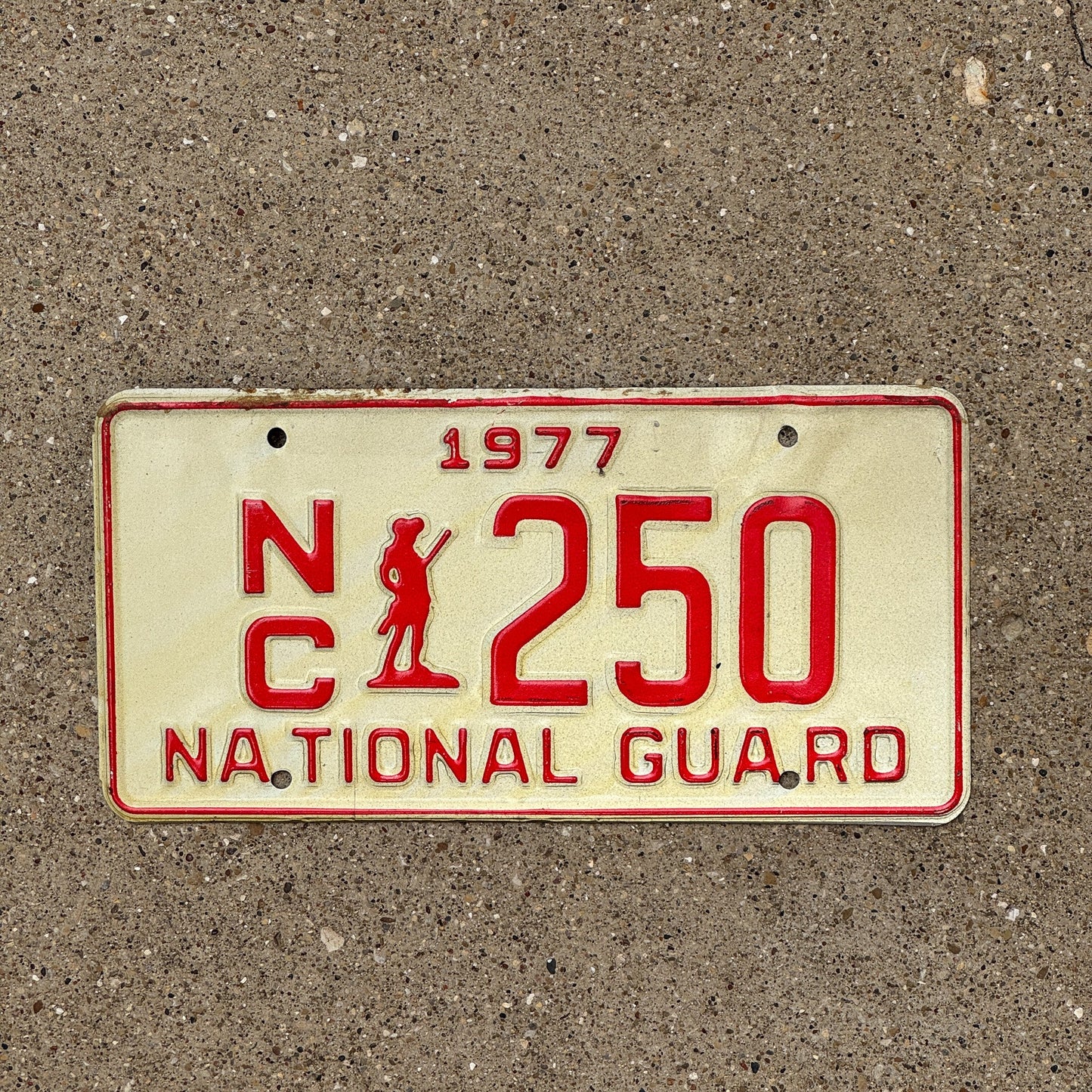 Photo of a 1977 North Carolina National Guard License Plate Auto Tag Garage Decor Vintage NC 250
