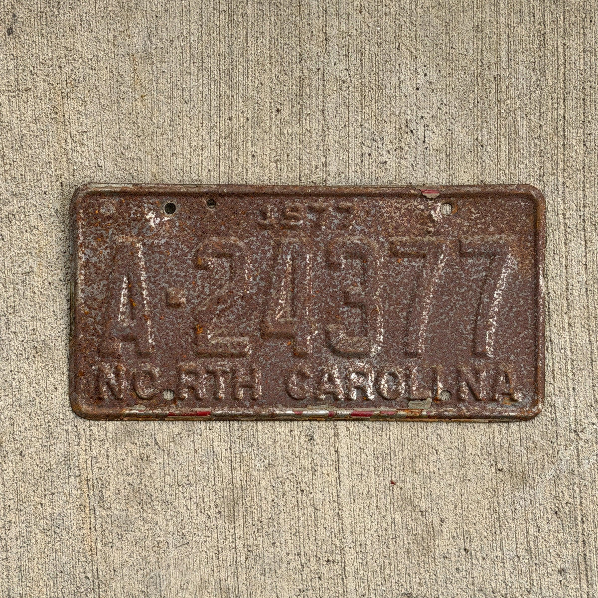 Photo of a 1977 North Carolina Trailer License Plate Auto Tag Garage Decor Vintage A 24377 with original patina