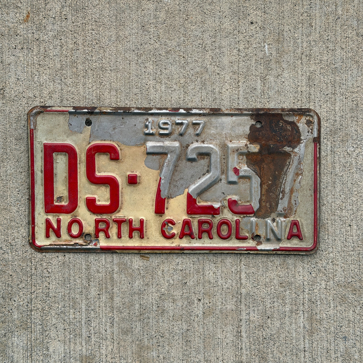 Photo of a 1977 North Carolina Truck License Plate Auto Tag Garage Decor Vintage DS 7257 with original patina