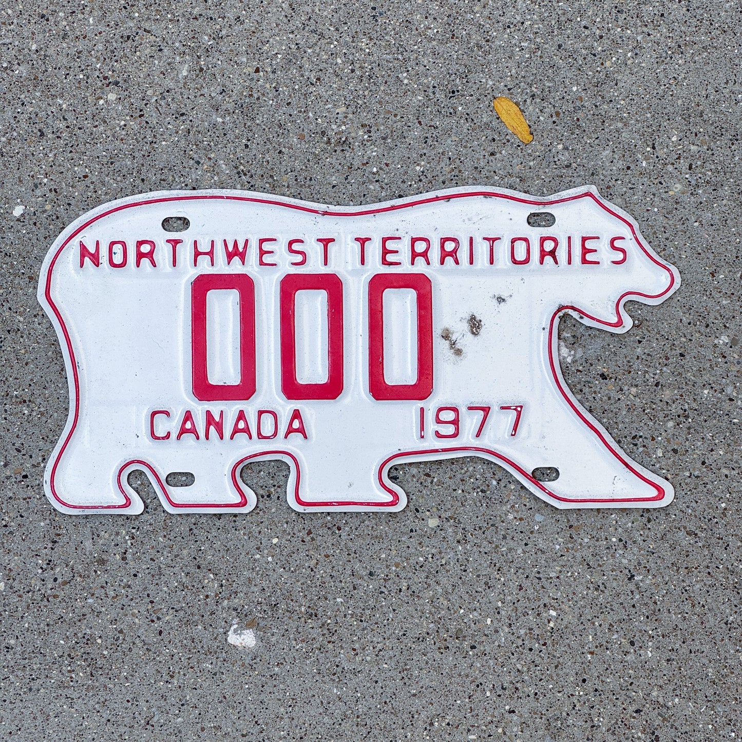 Photo of a 1977 Northwest Territories Sample License Plate Auto Tag Garage Decor Vintage Polar Bear 000