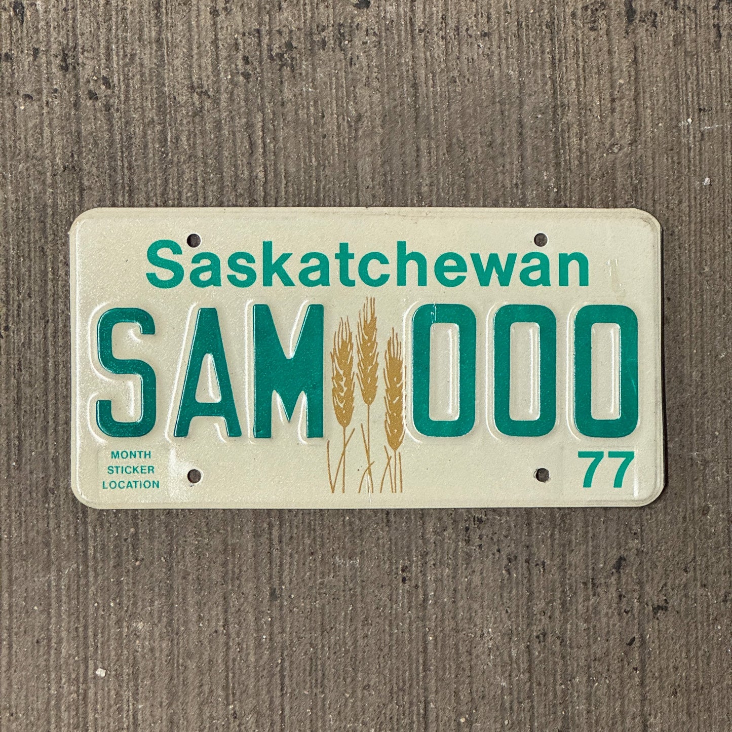 Photo of a 1977 Saskatchewan SAMPLE License Plate Auto Tag Garage Decor Vintage SAM 000