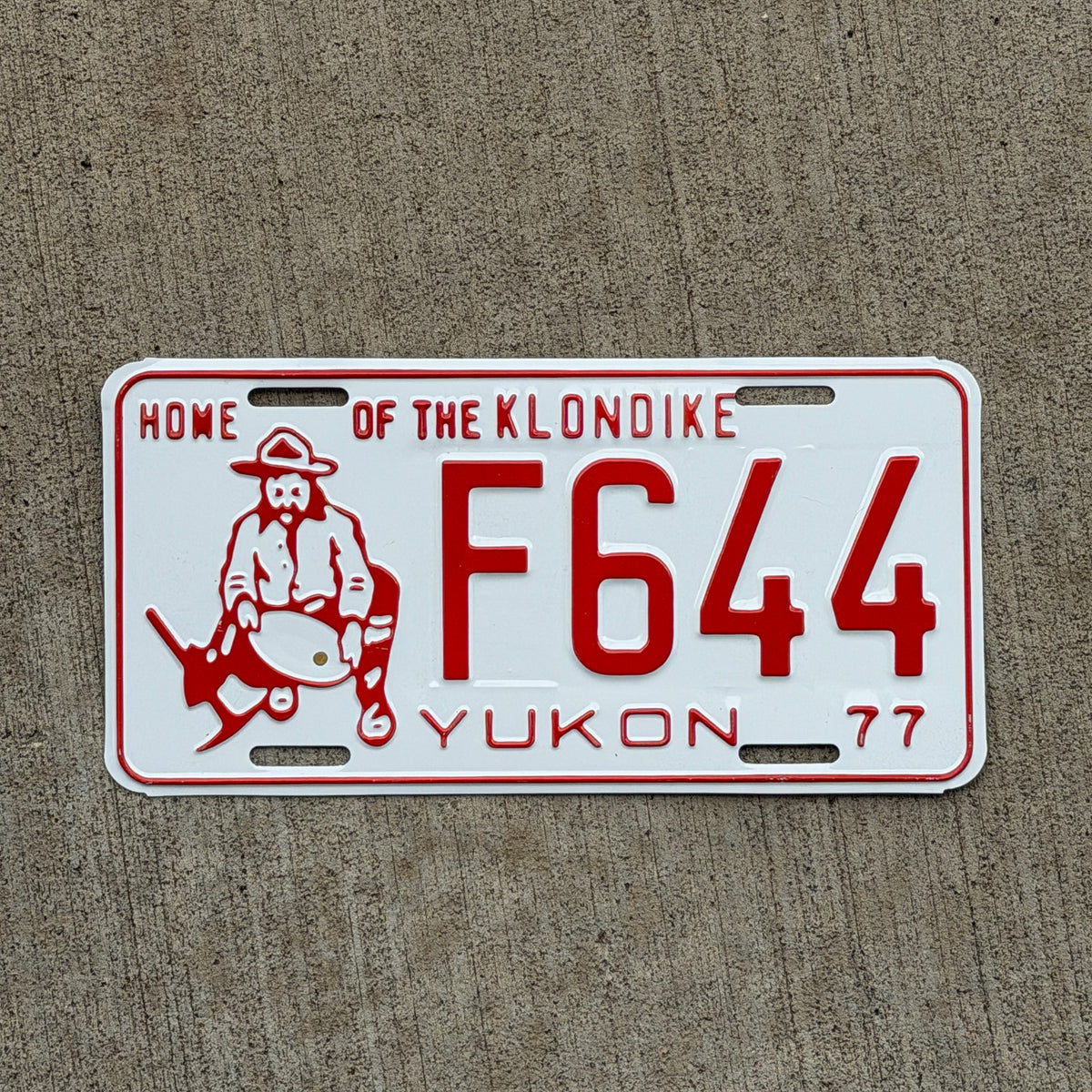 Photo of a 1977 Yukon License Plate Auto Tag 2 Vintage F 644 with original patina