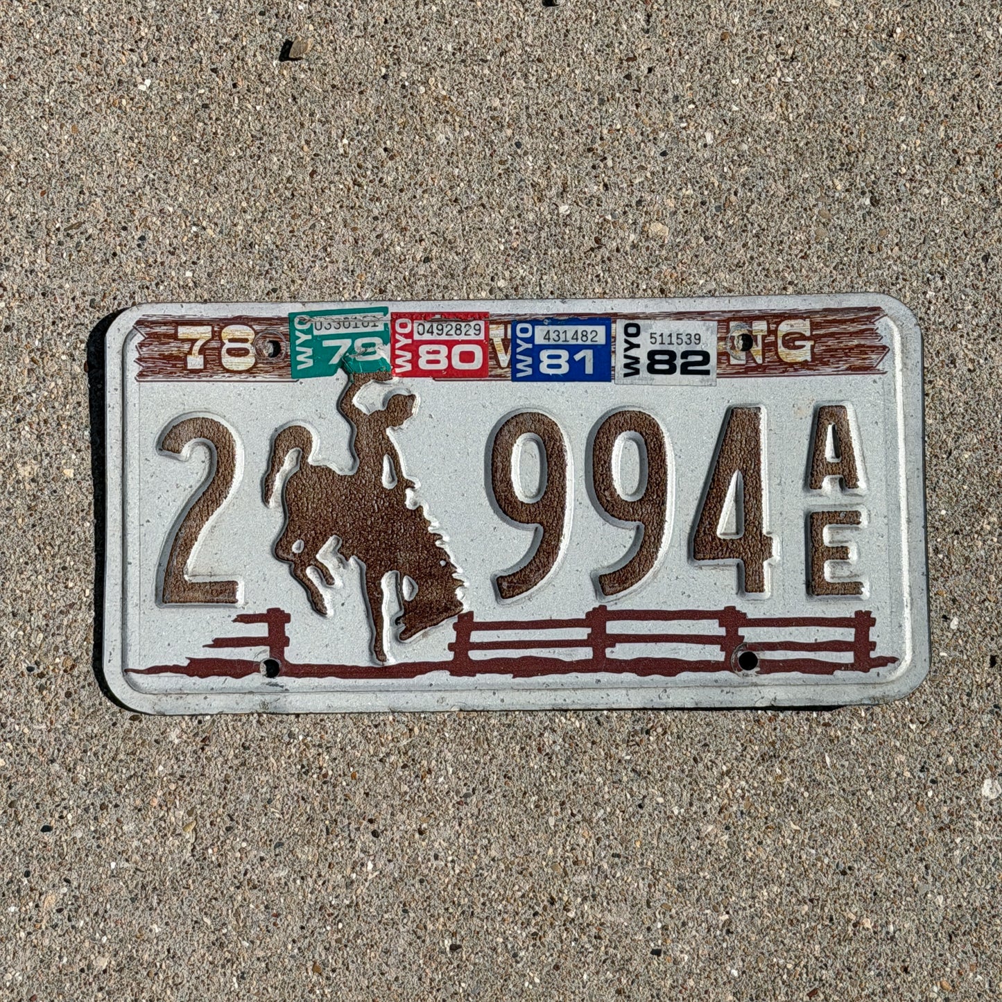 Photo of a 1978 1982 Wyoming License Plate Auto Tag Garage Decor Vintage Cowboy Rodeo 2 994 AE with original patina