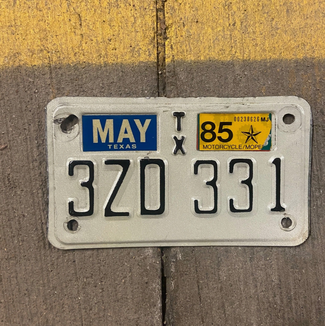 Photo of a 1978 1985 Texas Motorcycle License Plate Auto Tag Garage Decor Vintage 3 ZD 331 with original patina