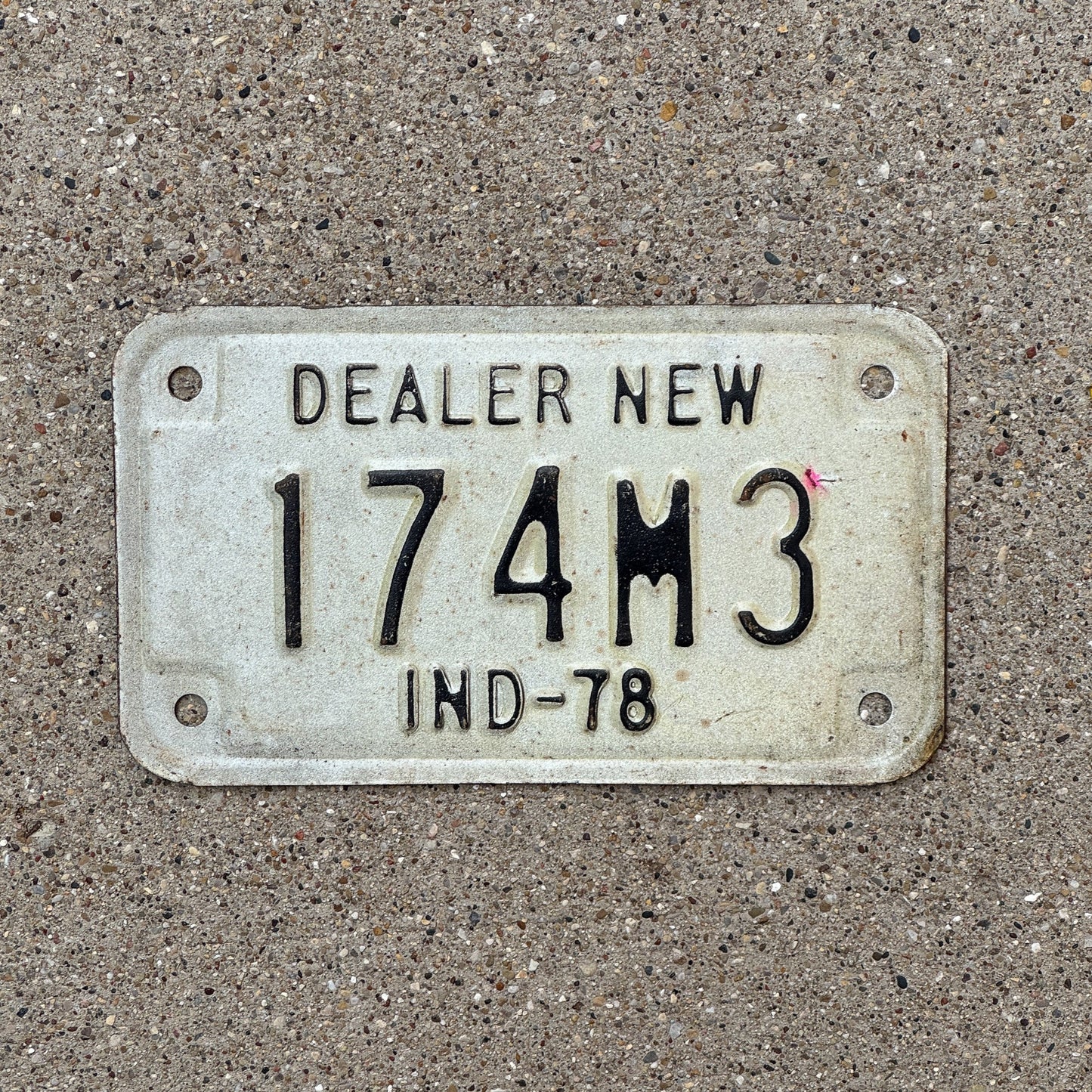 Photo of a 1978 Indiana Motorcycle Dealer License Plate Auto Tag Garage Decor Vintage 174 M 3 with original patina