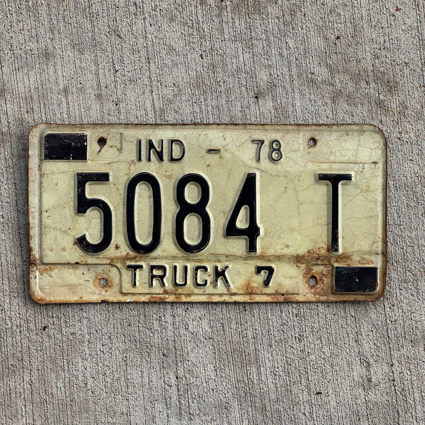 Photo of a 1978 Indiana Truck License Plate Auto Tag Garage Decor Vintage 5084 T with original patina