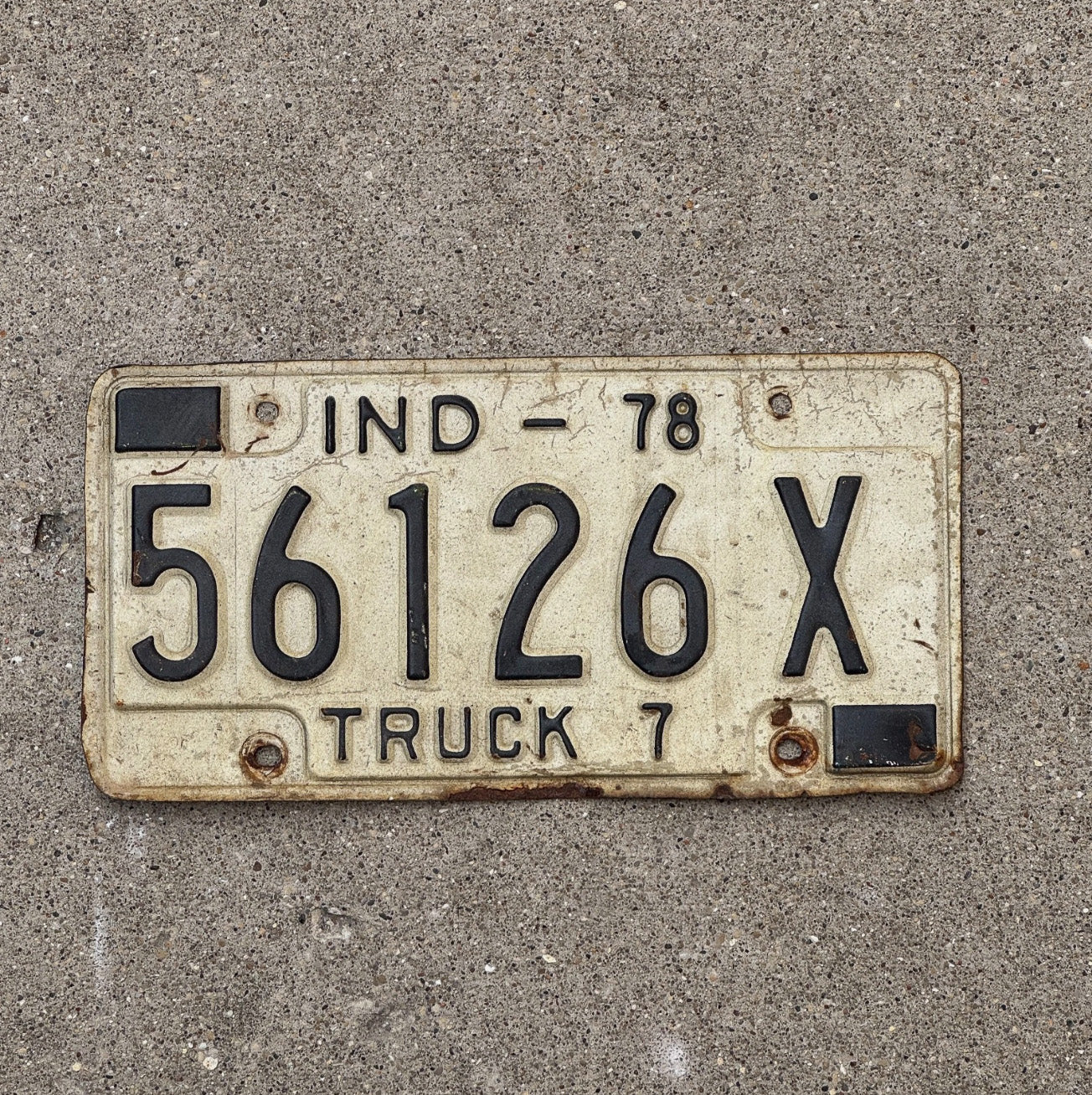 Photo of a 1978 Indiana Truck License Plate Auto Tag Garage Decor Vintage 56126 X