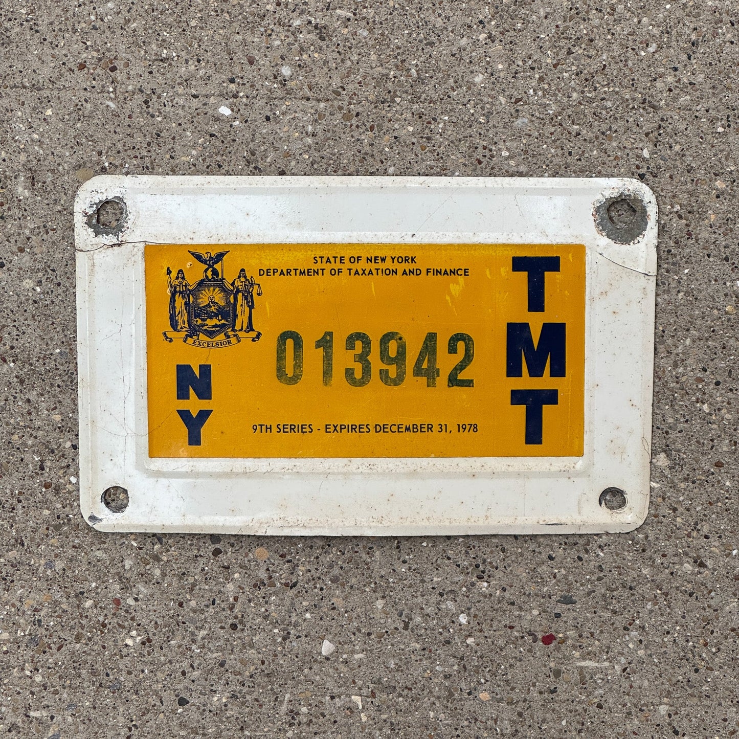 Photo of a 1978 New York Truck Mile Tax License Plate Auto Tag Garage Decor Vintage 9th Series 013942 with original patina