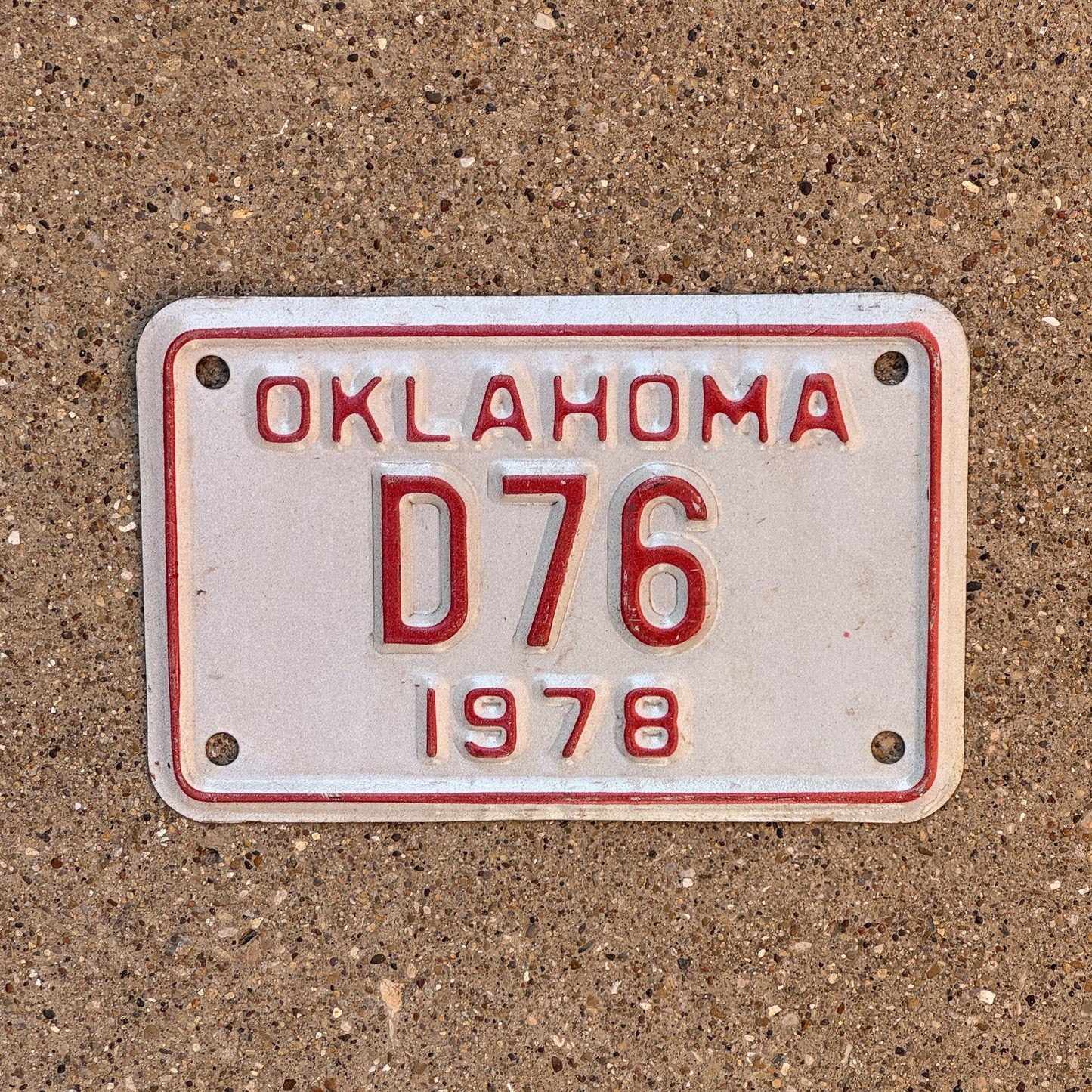 Photo of a 1978 Oklahoma Motorcycle Dealer License Plate Auto Tag Garage Decor Vintage D 76