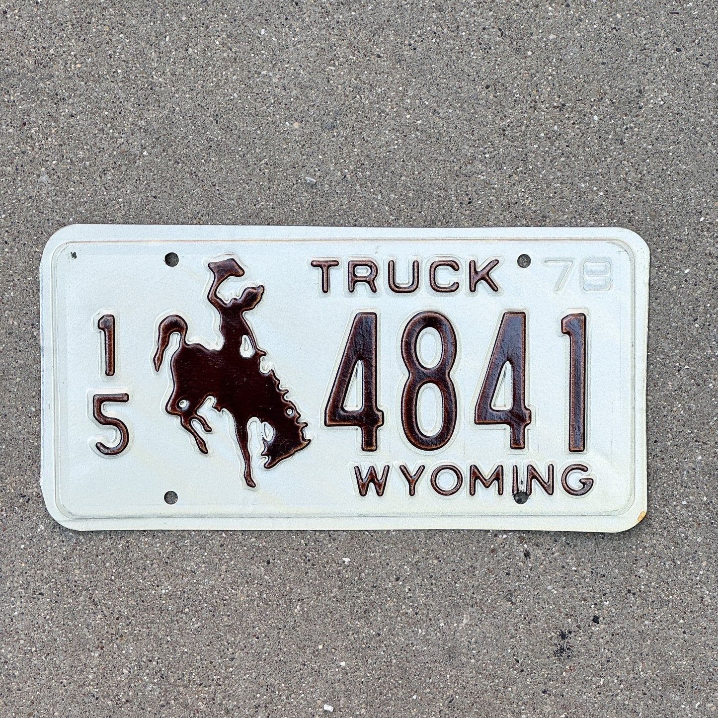 Photo of a 1978 Wyoming Truck License Plate Auto Tag Garage Decor Vintage Cowboy Rodeo 15 4841 with original patina