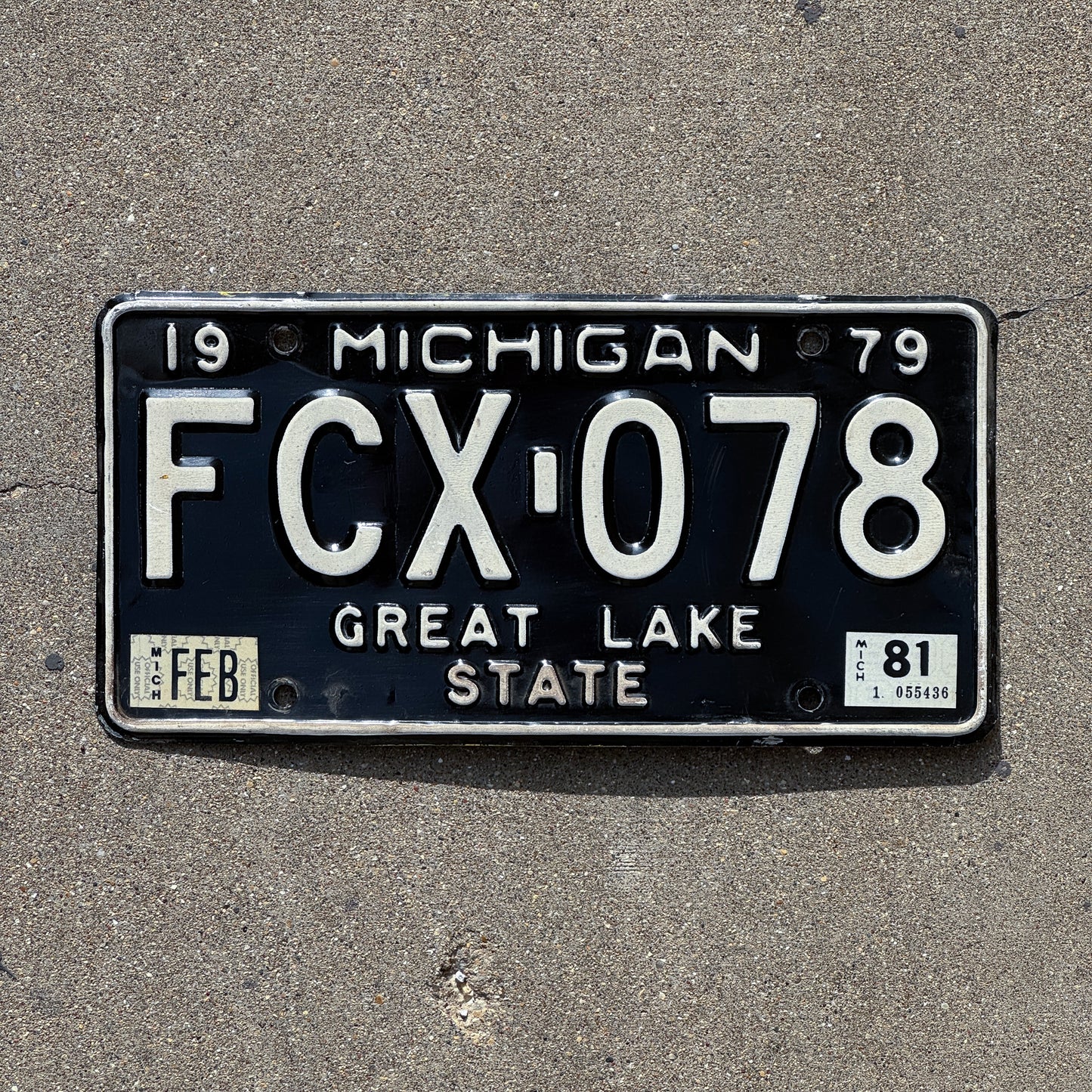 Photo of a 1979 1981 Michigan License Plate Auto Tag Garage Decor Vintage FCX 078 with original patina
