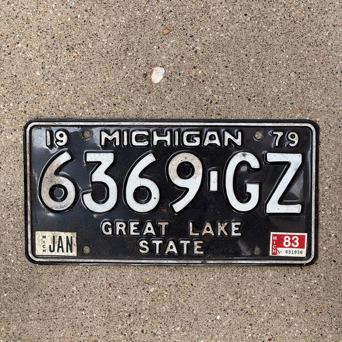 Photo of a 1979 1983 Michigan Commercial Truck License Plate Auto Tag Garage Decor Vintage 6369 GZ