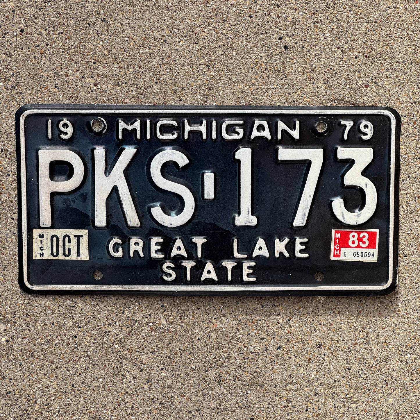 Photo of a 1979 1983 Michigan License Plate Auto Tag Garage Decor Vintage PKS 173 with original patina