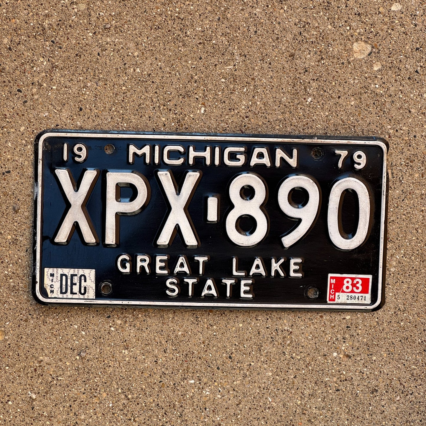 Photo of a 1979 1983 Michigan License Plate Auto Tag Garage Decor Vintage XPX 890