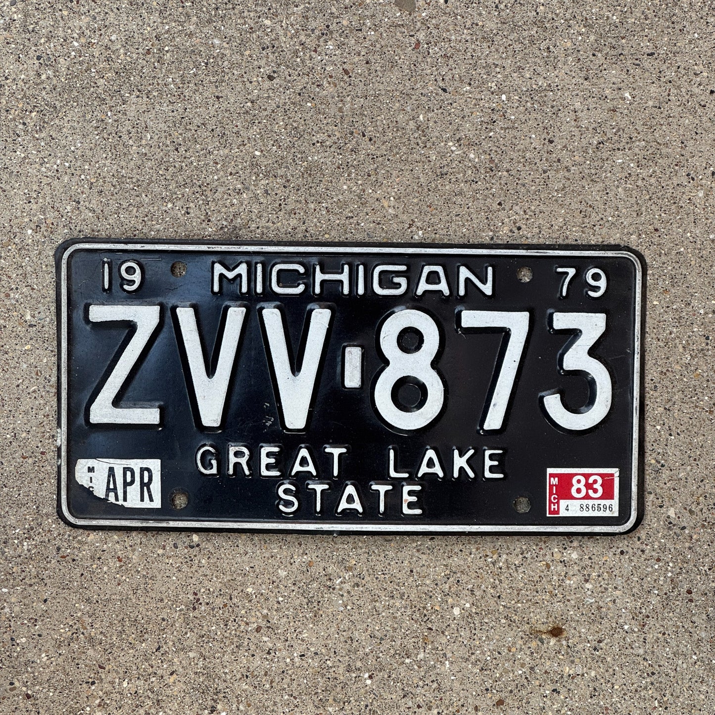 Photo of a 1979 1983 Michigan License Plate Auto Tag Garage Decor Vintage ZVV 873