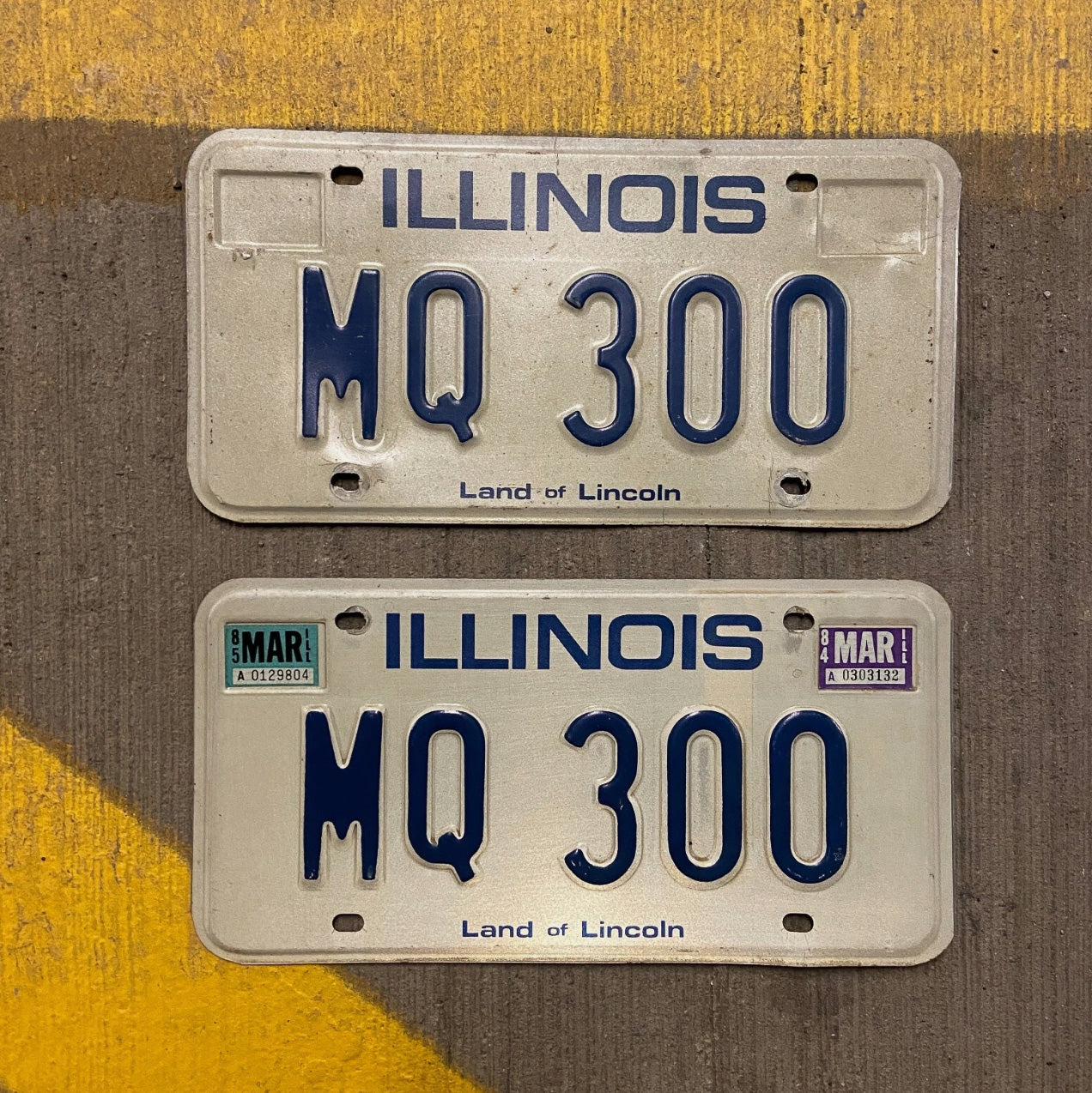 Photo of a 1979 1985 Illinois License Plate Pair Auto Tag Garage Decor Vintage MQ 300 with original patina