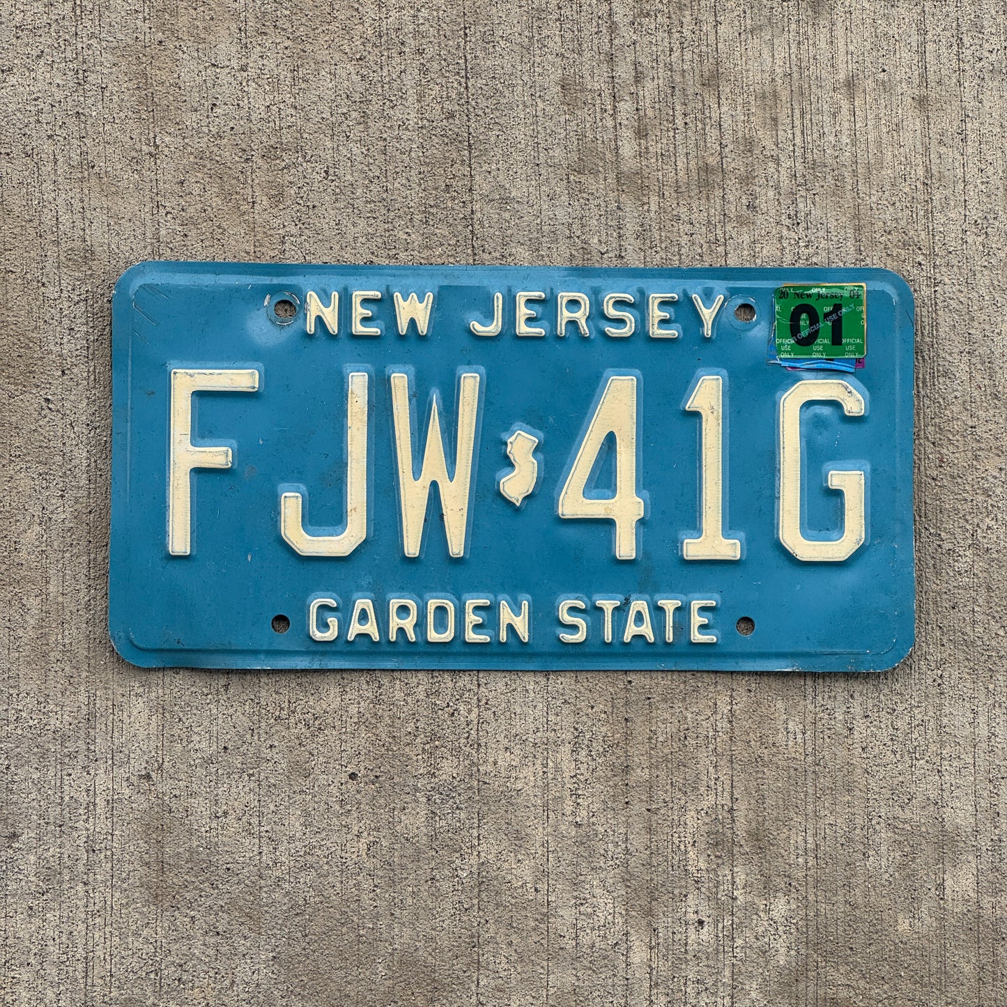 Photo of a 1979 2001 New Jersey License Plate Auto Tag 2 Vintage Garage Blue FJW 41G with original patina