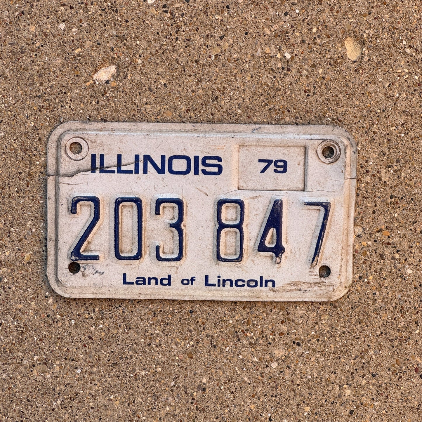Photo of a 1979 Illinois Motorcycle License Plate Auto Tag Garage Decor Vintage 203 847
